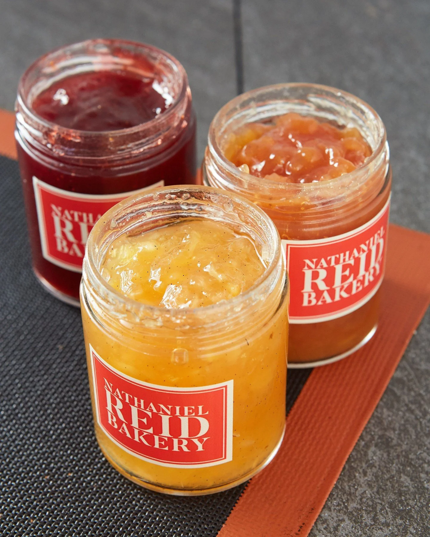 Brighten your mornings and elevate your desserts with our seasonal jams. Bursting with flavor, they're delicious on toast, pastries, stirred into yogurt, or in your favorite recipes-- savory and sweet. Available in a variety of seasonal flavors, come