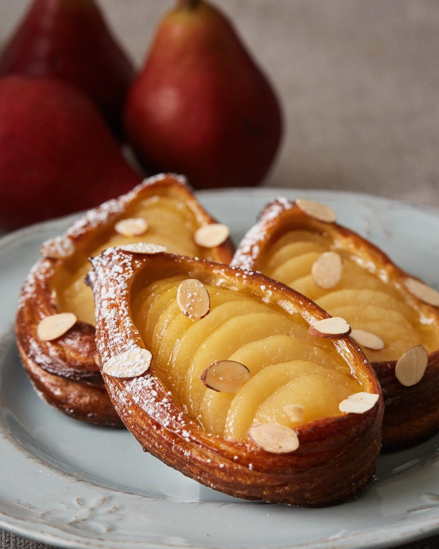 Nothing says fall quite like our Pear Danish. 🍐 Flaky croissant, almond cream, and juicy poached pear, this seasonal sweet is available every morning starting this week.
