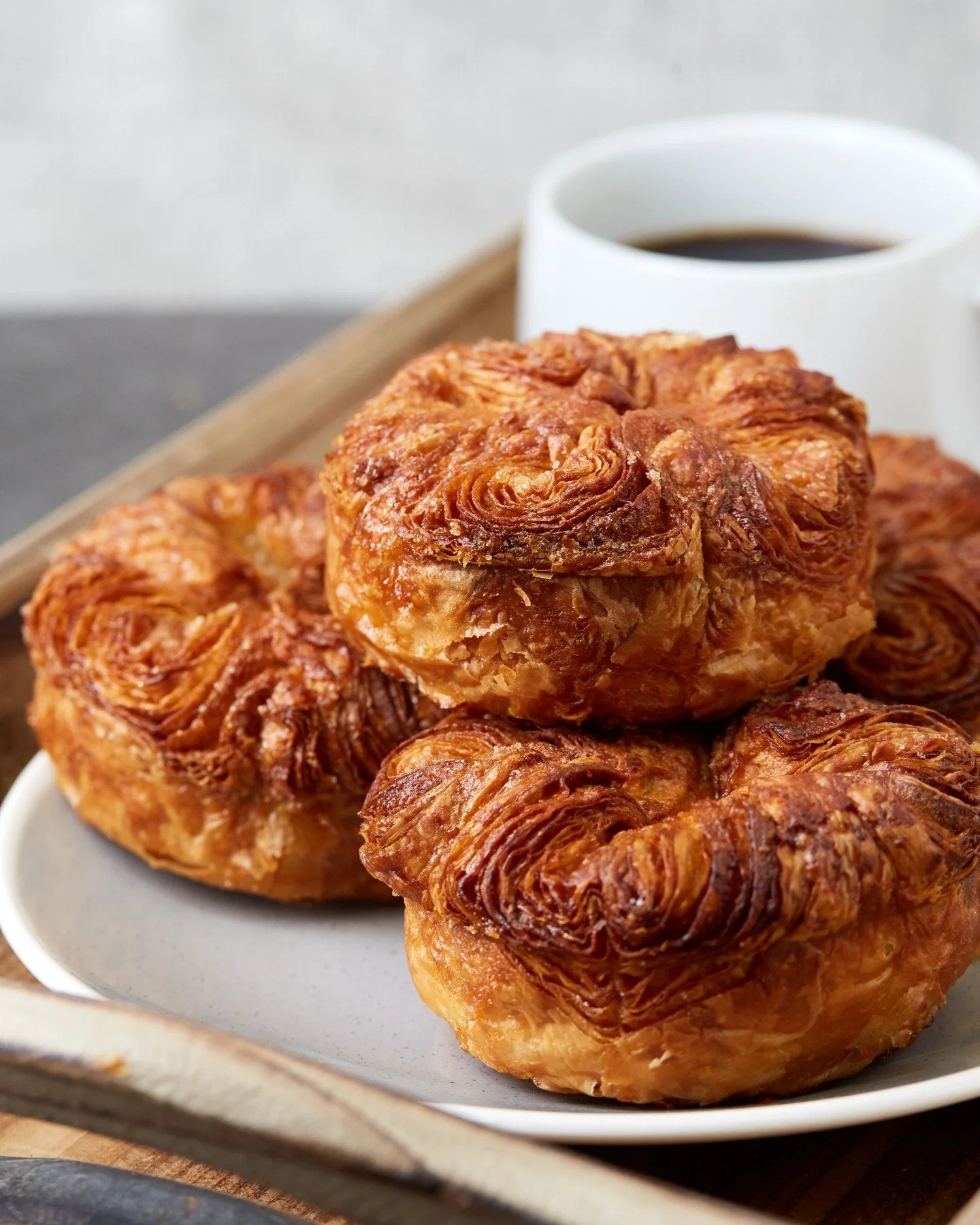 You know that feeling when one bite of food just makes your day? That&rsquo;s our Kouign Amann. Flaky, buttery, caramelized perfection. Stop by and grab one before they disappear!