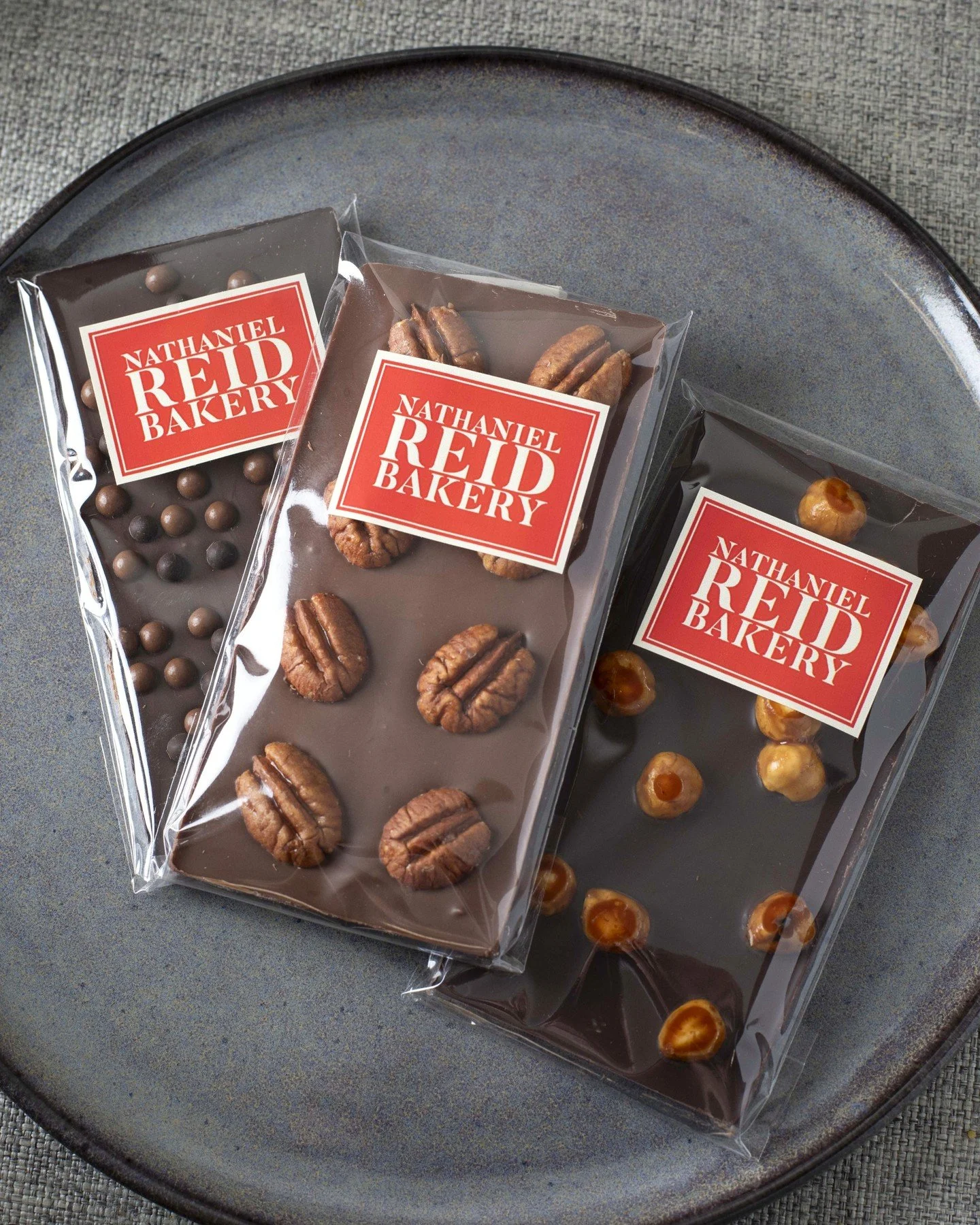 Halloween is better with chocolate.
Which would you pick: dark, milk, or a nutty chocolate tablet? Stop by and grab your favorite before they vanish! 👻