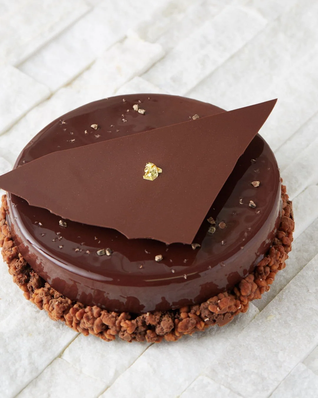 If you forgot to place a pre-order, there's no need to stress. Our showcases are packed and we're here until 4pm, ready to serve you. Stop by and grab your festive favorites while they last-- like our dark chocolate &amp; hazelnut Guyana cake!