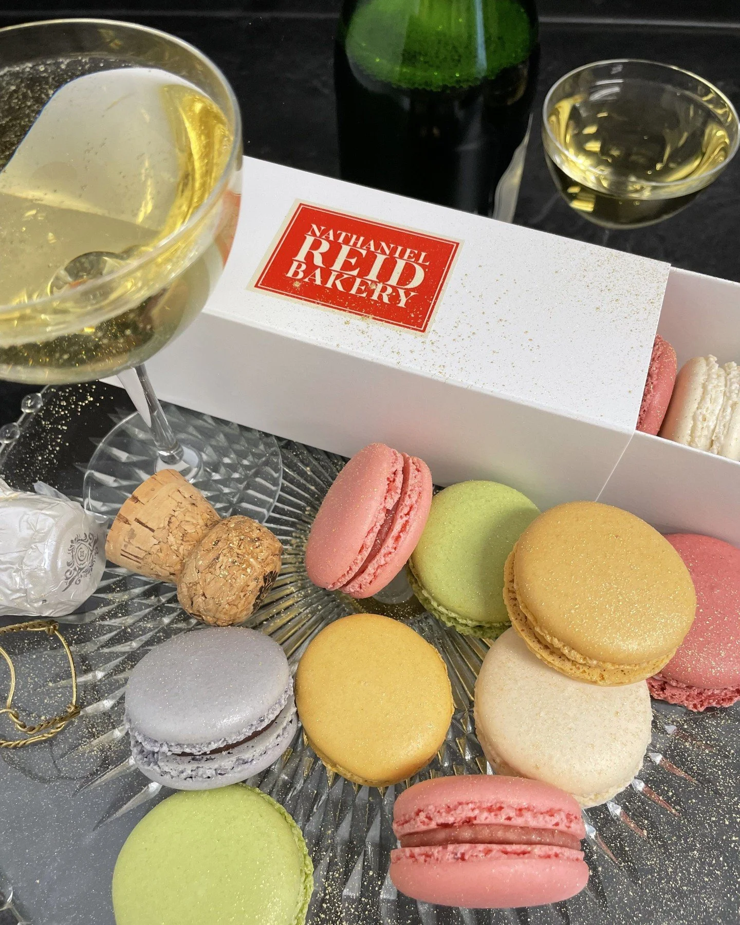 Planning your New Year's Eve spread? Our macarons are available individually or in 6- and 12-piece boxes-- easy to take to parties, share with friends, or gift to someone special. Stop by today to pick out your favorite flavors!