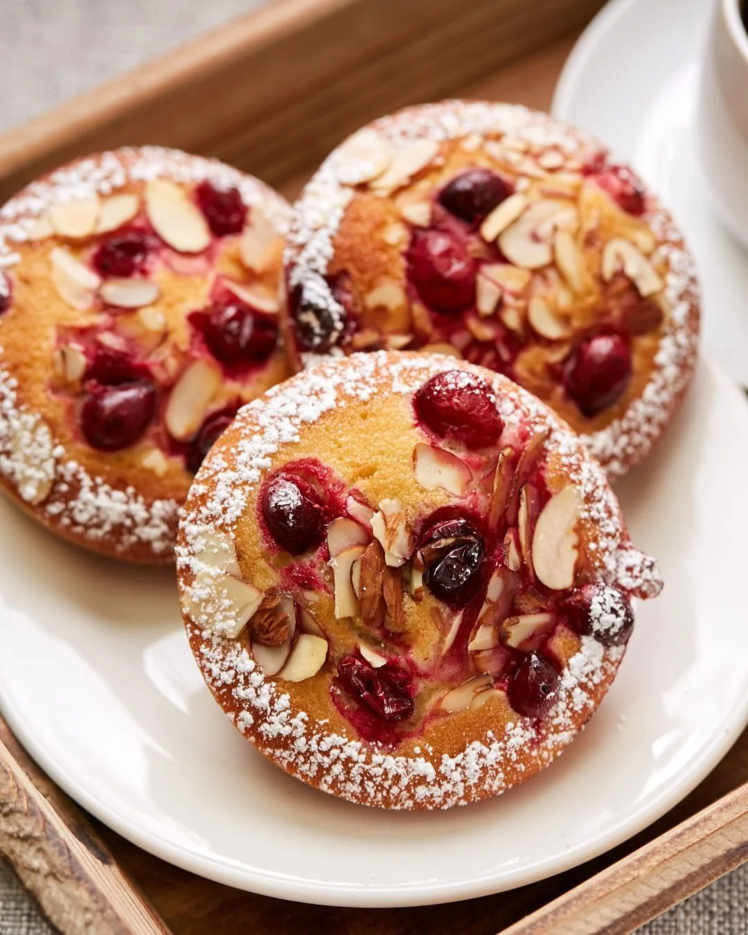 Our seasonal Financier is a buttery almond cake made with bright orange zest and tart cranberries&mdash; it's baked until golden and perfect with a hot cup of coffee or tea.