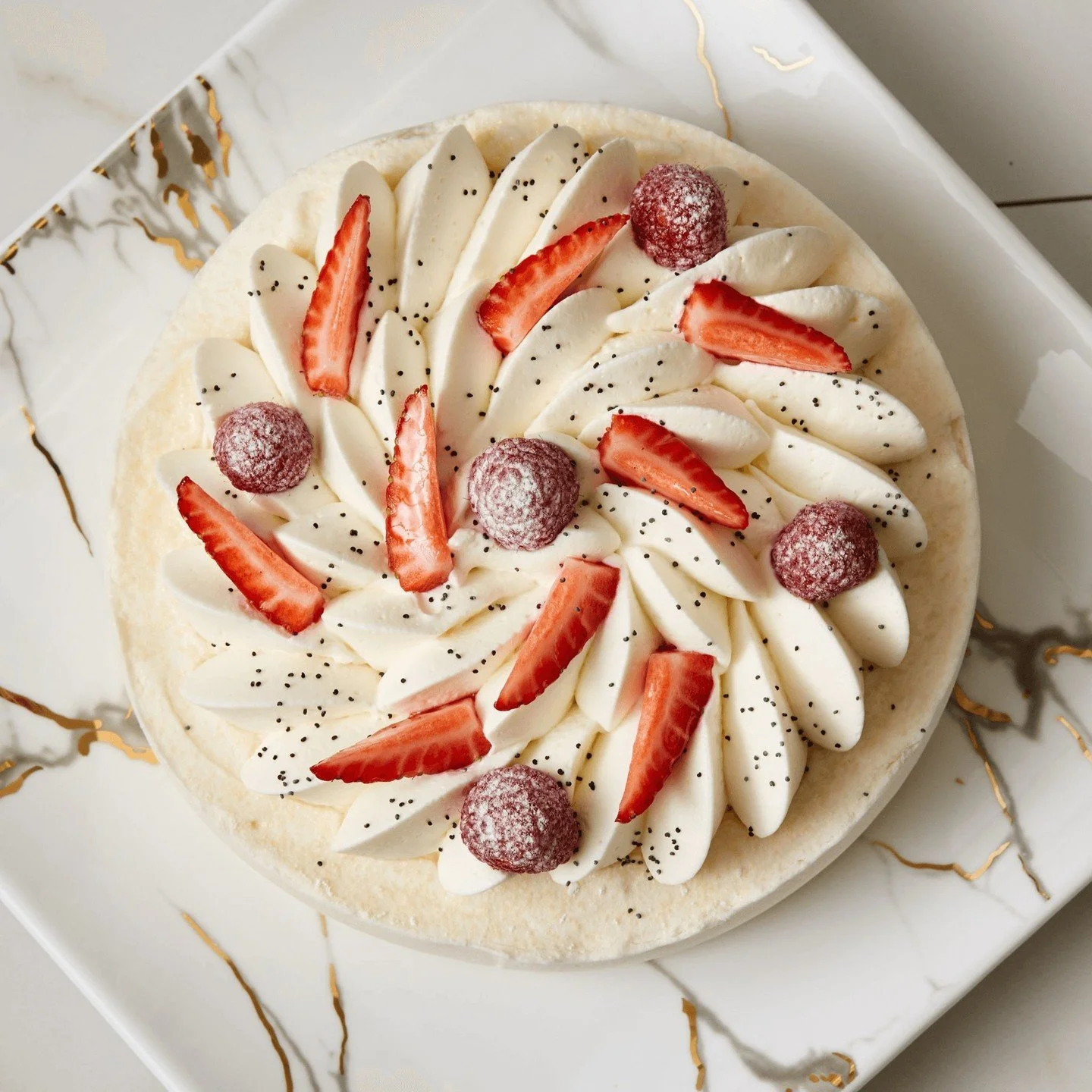 Crispy, melt-in-your-mouth meringue, yogurt Chantilly, fresh fruit compote.
The Pavlova is light, fresh, and gluten-free! 

Available in 6" and larger sizes, give us a call at 314-858-1019 to order now!