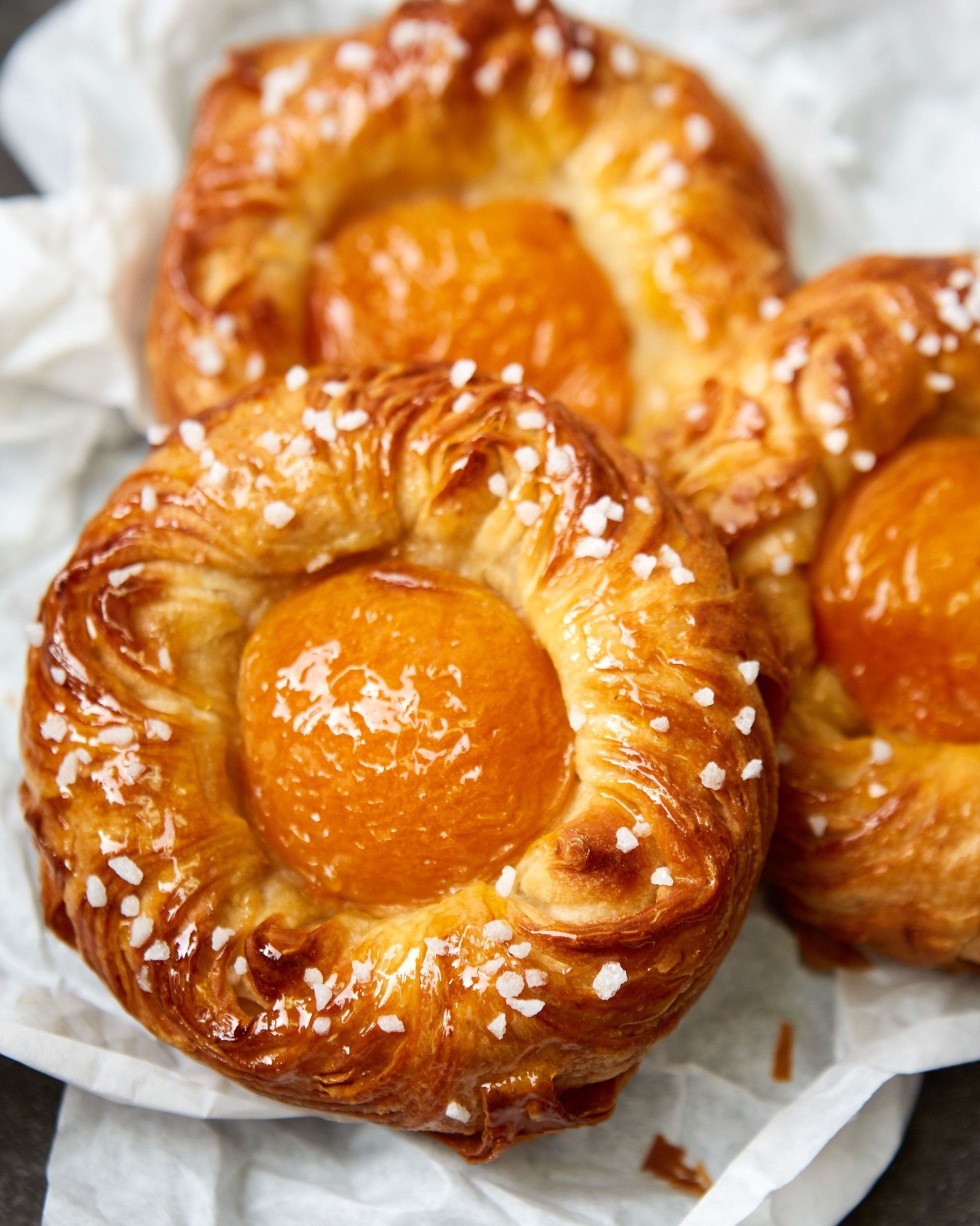 The Apricot Danish has returned to our showcases! 

Juicy apricot, rich pastry cream, flaky croissant, and sweet apricot glaze... there's no better way to start your day than with this bite of sunshine. ☀️