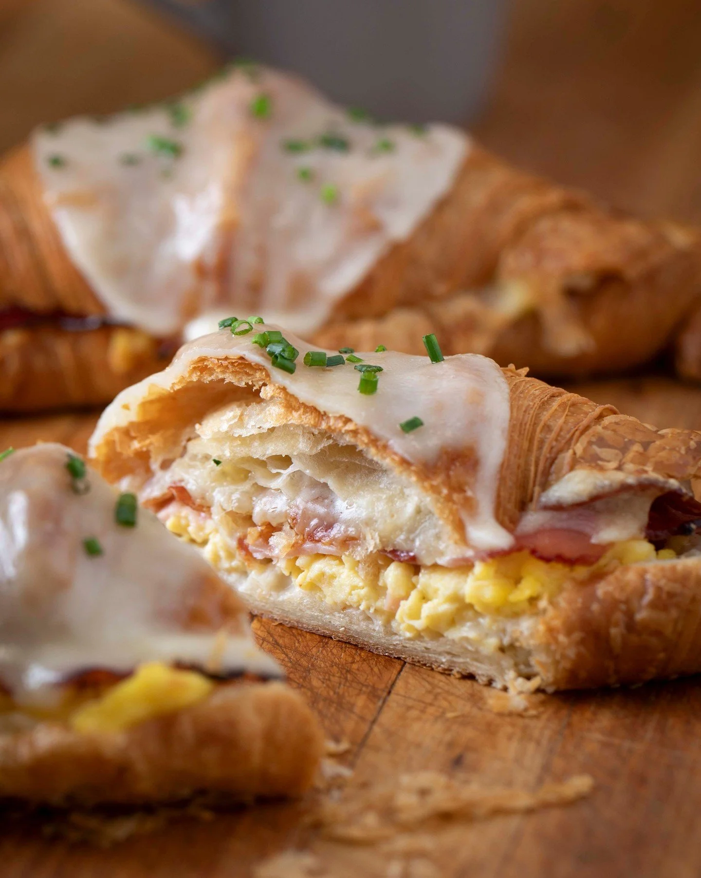 Buttery, flaky croissant, melty cheese, smokey bacon and ham, and fluffy scrambled eggs... what else could you want in a breakfast? 

Available starting at 8am today and every Saturday!