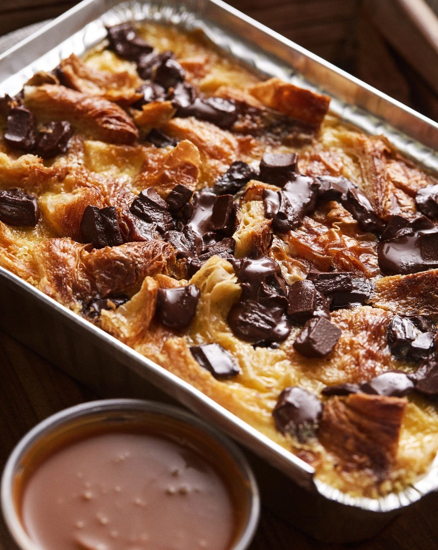 Planning a cozy night in this Mother's Day? Our Bread Pudding is easy to order in advance and reheat whenever you're ready. Made with our Chocolate Croissants, velvety sweet custard, and served with a side of salted caramel sauce... because she deser