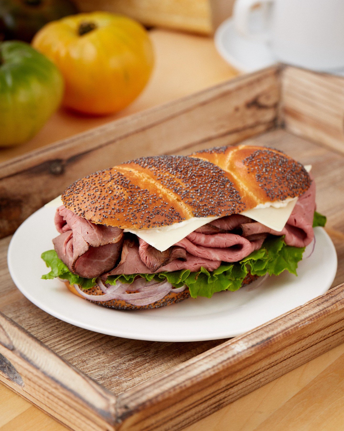 Take a break from packing lunch and try our guest-favorite Roast Beef Sandwich! It piles juicy roast beef on housemade poppy seed challah bread with horseradish aioli, white cheddar, and thinly sliced red onions.