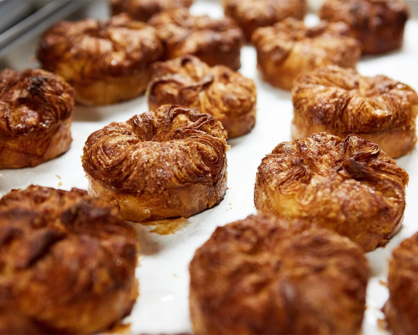 Some pastries are subtle, but not this one.

Our Kouign Amann bakes layers of butter and sugar into a deeply golden pastry that's crackly on the outside, soft and almost custard-like on the inside.

It&rsquo;s simple ingredients pushed to their absol