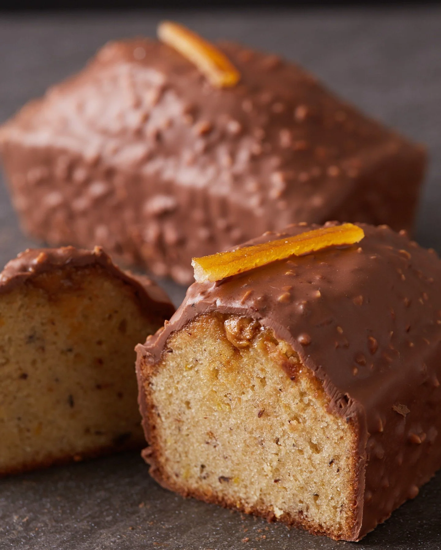 The Hazelnut Milk Chocolate Pound Cake is back!

Moist hazelnut brown butter cake infused with orange and lemon zest and coated in milk chocolate with crunchy hazelnut praline pieces, it's Chef Reid's favorite menu item for a reason.

Available now i