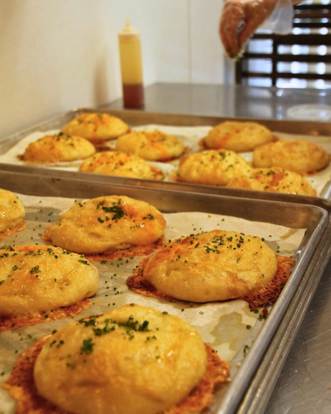Chewy focaccia baked with four cheeses, drizzled with honey, and sprinkled with chives. Simple ingredients, unbelievably delicious.