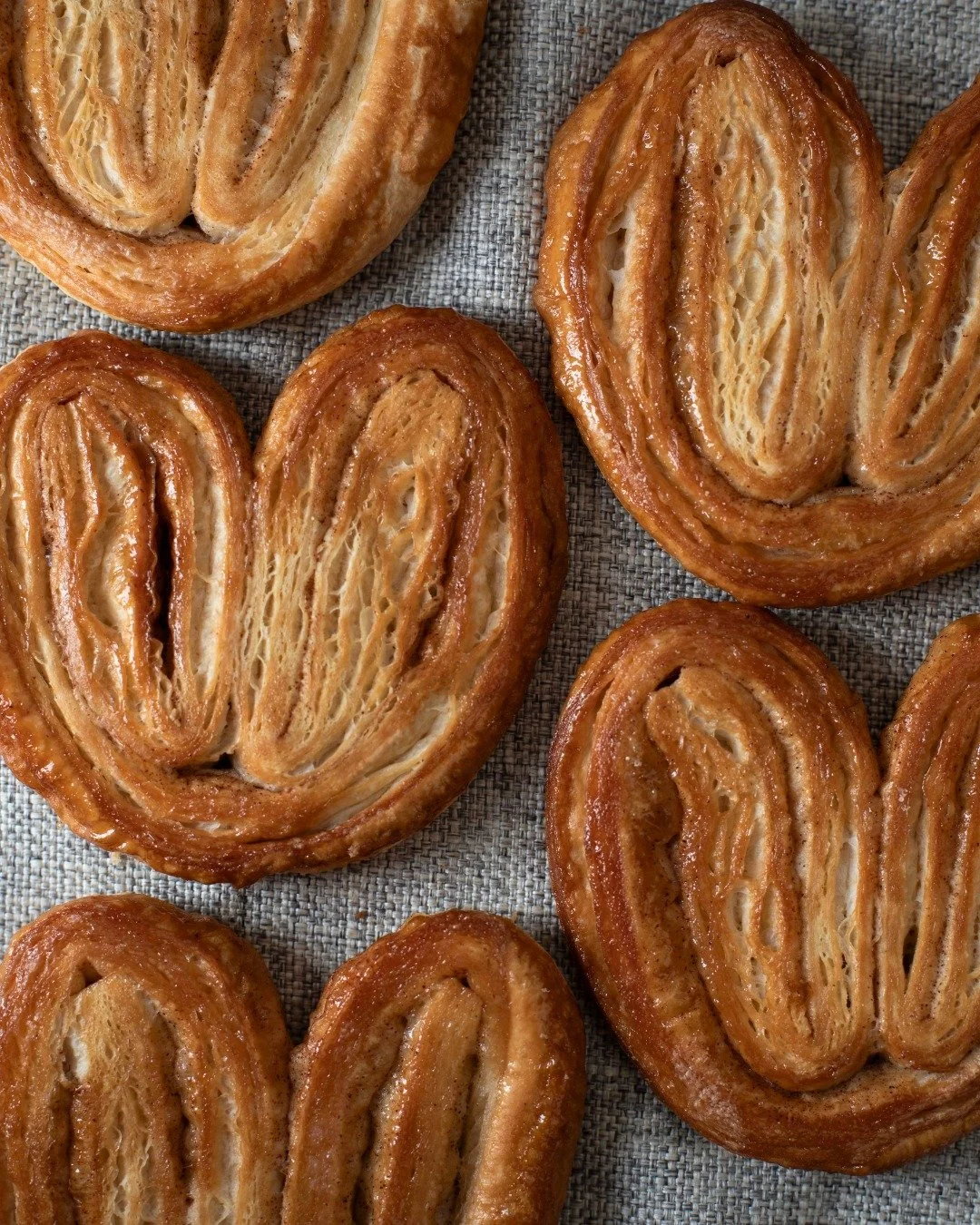 With your morning coffee or tea, we recommend our Cinnamon Sugar Palmier. It's buttery, flaky, lightly sweet, and perfect for dunking.