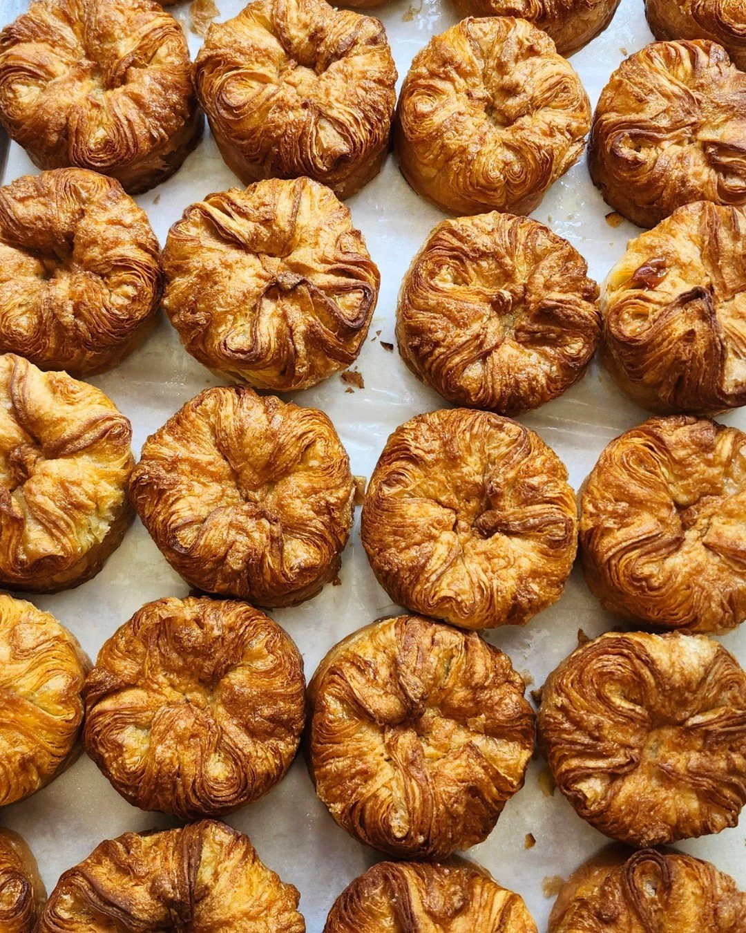 With a crunchy, caramelized crust, buttery, flaky interior, and a hint of salt, our Kouign Amann has earned its place as one of our most-loved pastries. 

Make your Saturday a little sweeter and stop by before they're gone.