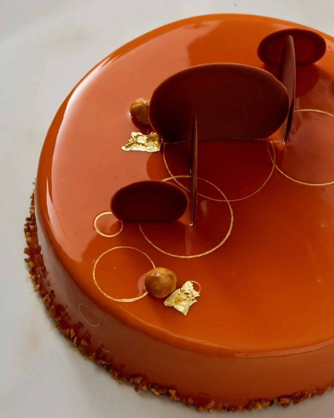 Our 10-year anniversary cake vote was so close, we couldn't stop at just one. That's why we're bringing back another fan favorite for a special limited return... the Kyoto!

This hazelnut cake layered with yuzu caramel and hazelnut milk chocolate mou