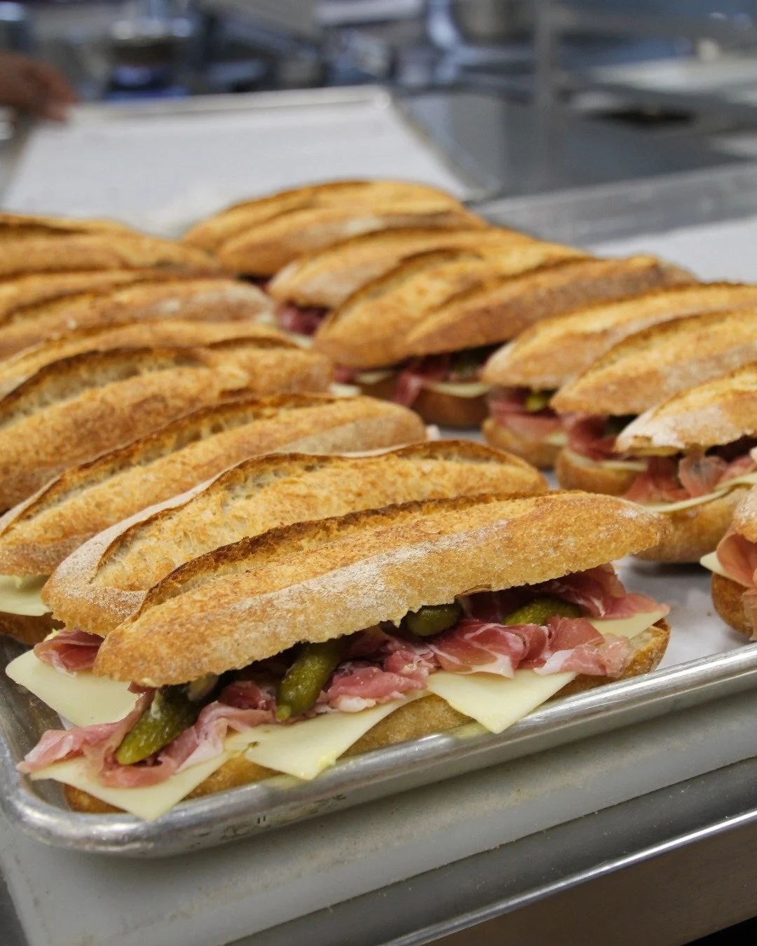Simple, quality ingredients, done right. 

Prosciutto, cornichons, Gruy&egrave;re, and Dijon aioli on our housemade buttered baguette. 

Salty, tangy, savory, and satisfying. Available today and everyday, stop by for lunch