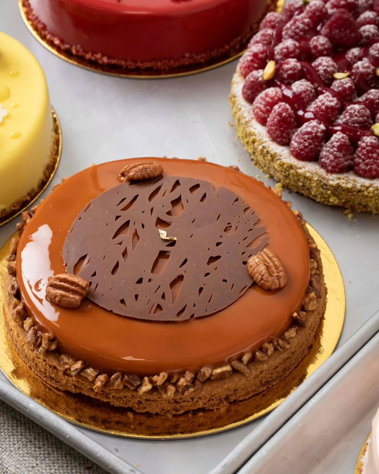 Velvety salted caramel mousse, buttery sabl&eacute; Breton, and pecan caramel are brought together in the Amber. Serves 6 and makes a beautiful addition to any weekend dessert table.

Or if you just want something for yourself? Individual Ambers are 