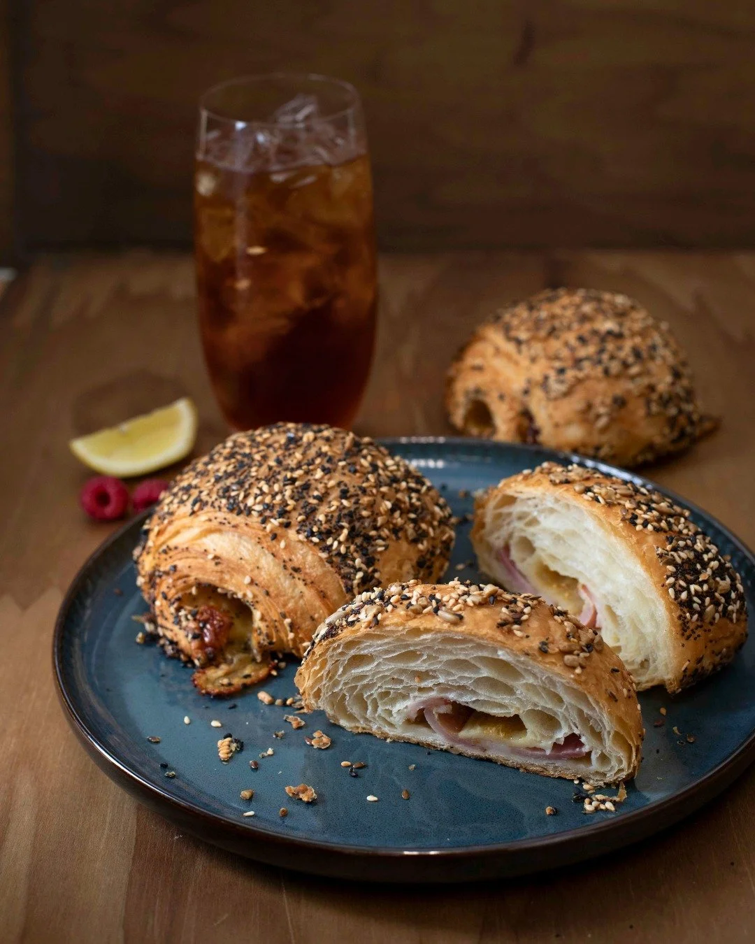 Not your average ham and cheese.

Buttery croissant wrapped around smoked ham, melty Gruy&egrave;re, and whole grain mustard, with a generous coating of poppy, sesame, and sunflower seeds.

Flaky pastry, toasted seeds... the crumbs are worth it.