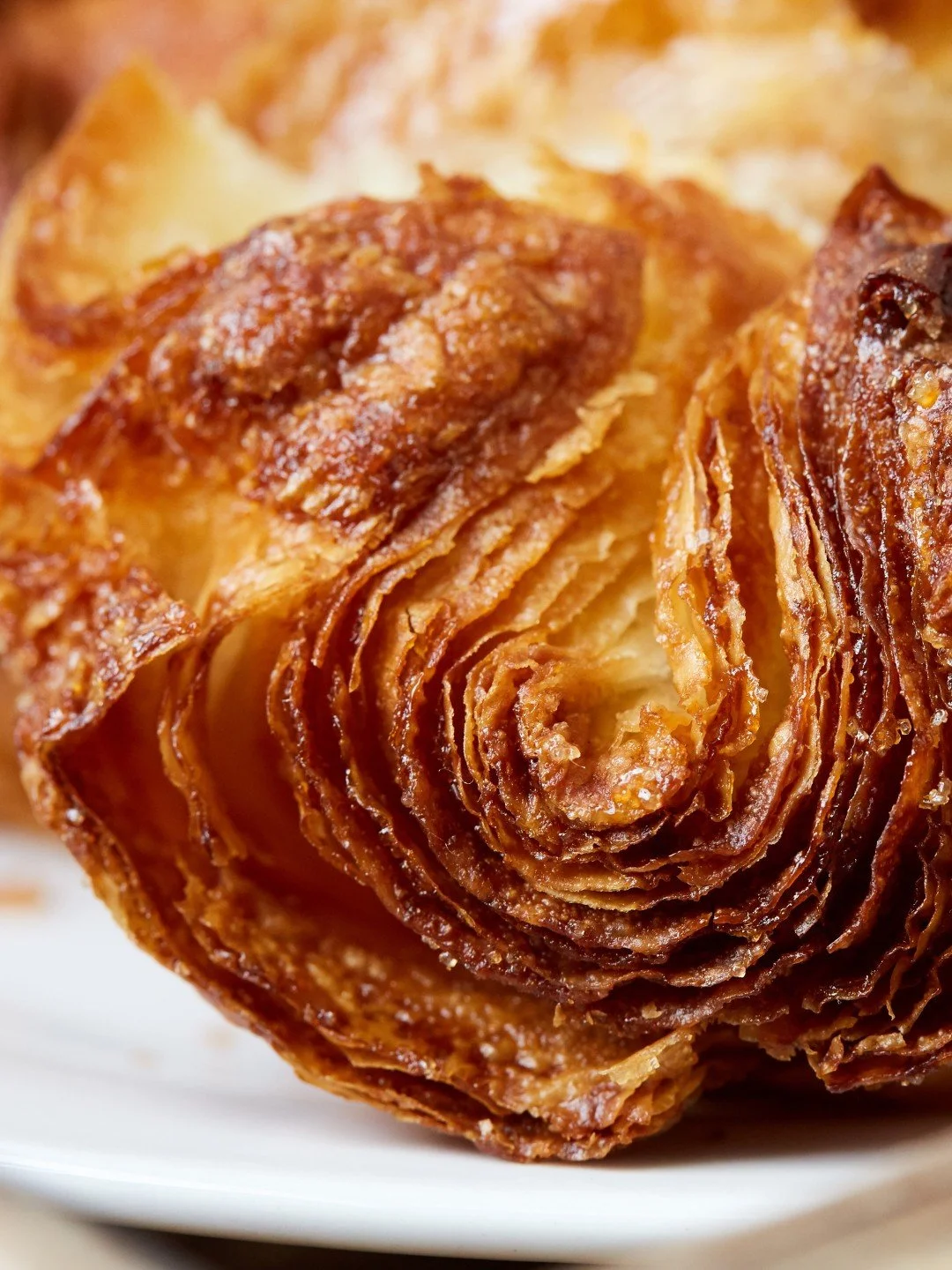 The unmistakable layers, the golden, caramelized finish... you know the Kouign Amann when you see it. 

Find yours today, fresh out of the oven at Nathaniel Reid Bakery.