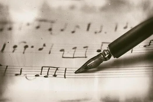 Writing musical-score-with-fountain-pen-photo.jpg