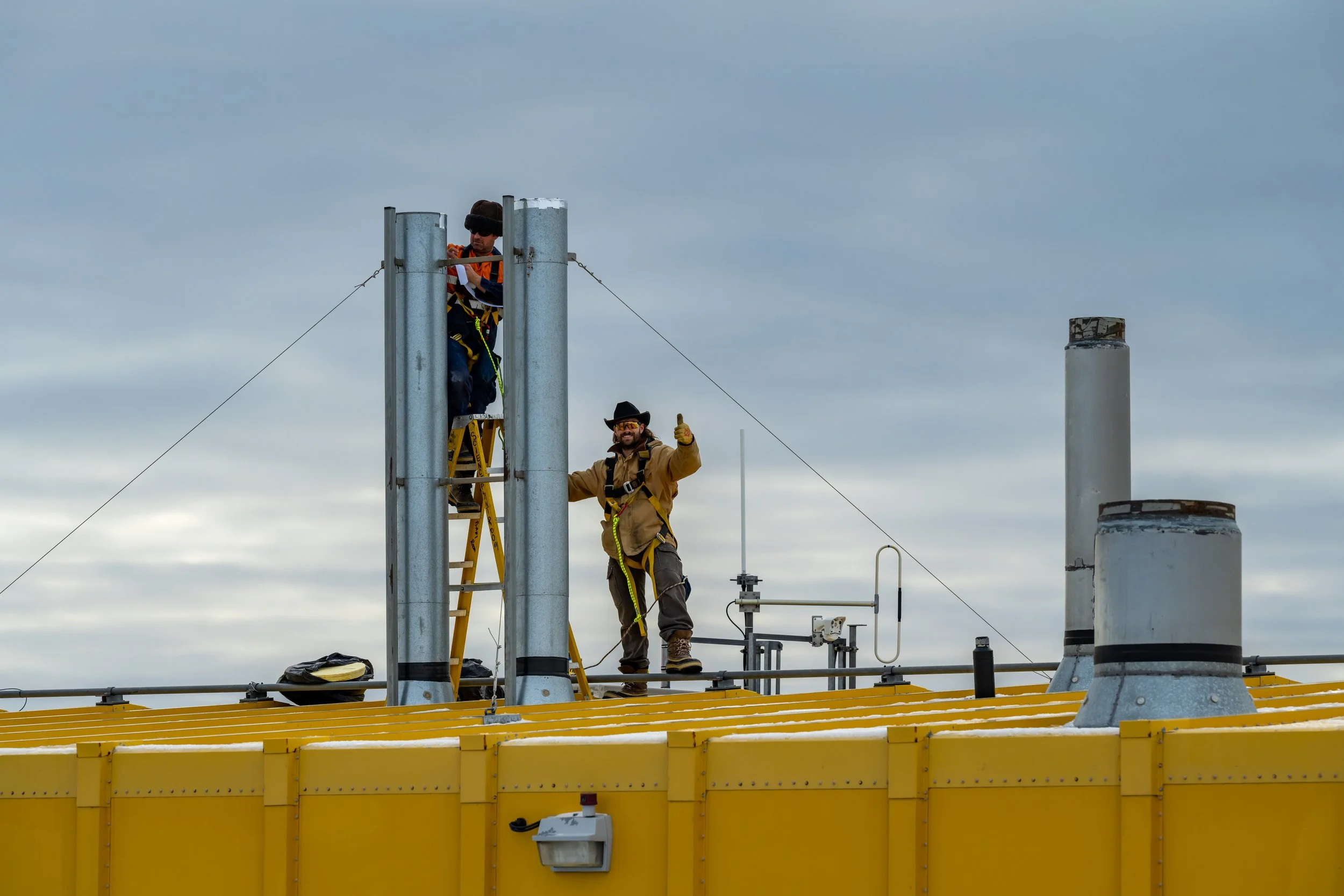 C135 - Plumbers at work on  the Science building