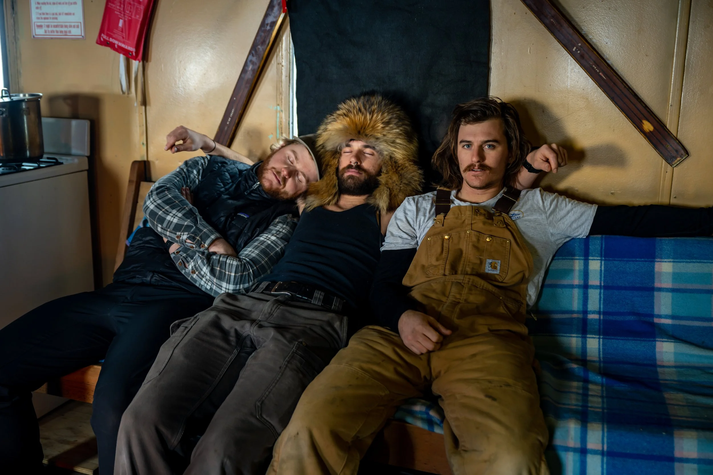 C204 - Zack, Ben and Lachy relaxing by the stove at the Wilkes Hilton