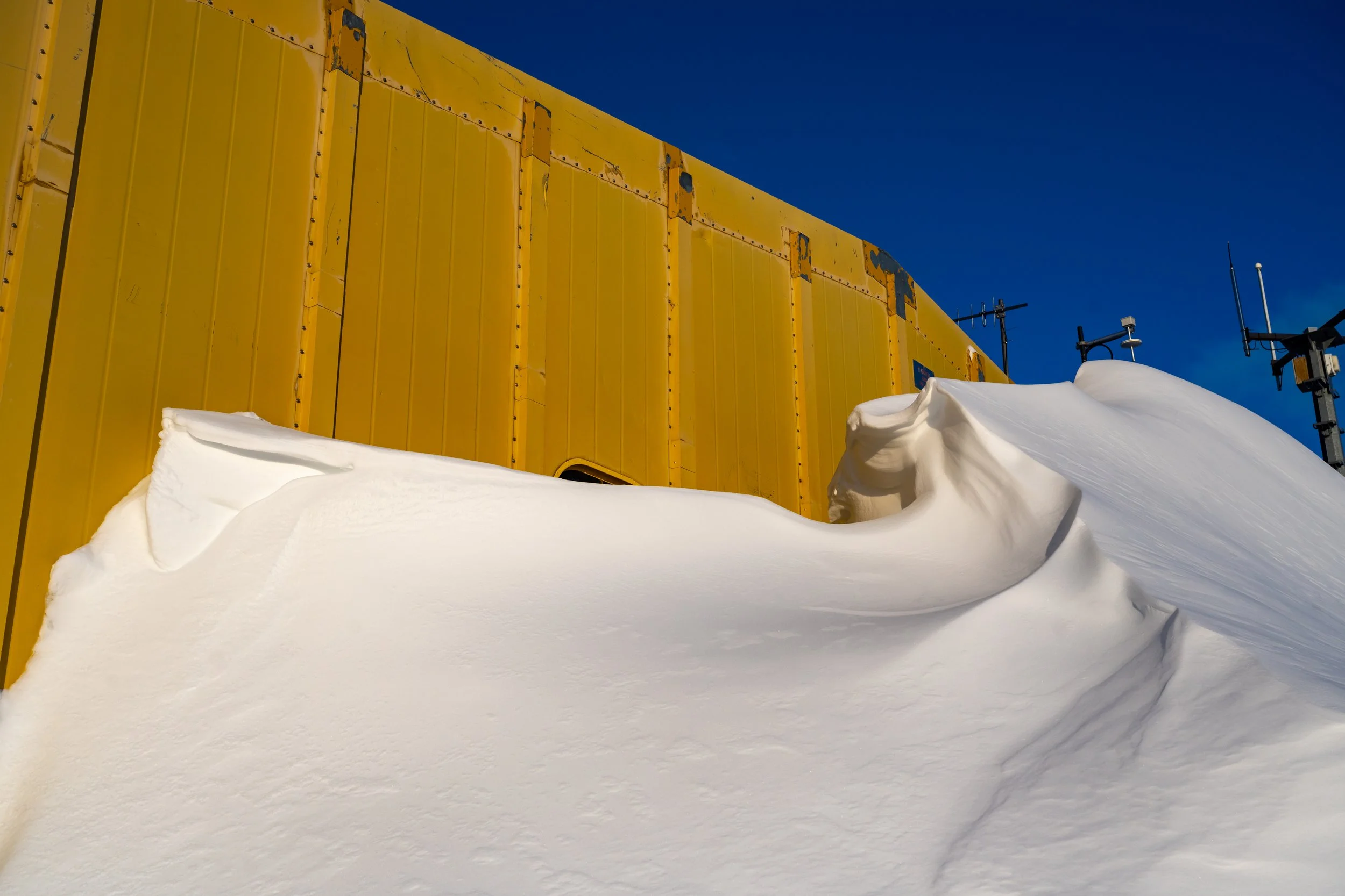 C222 - Sculpted Blizz tail at the lee of the Operations/Met building