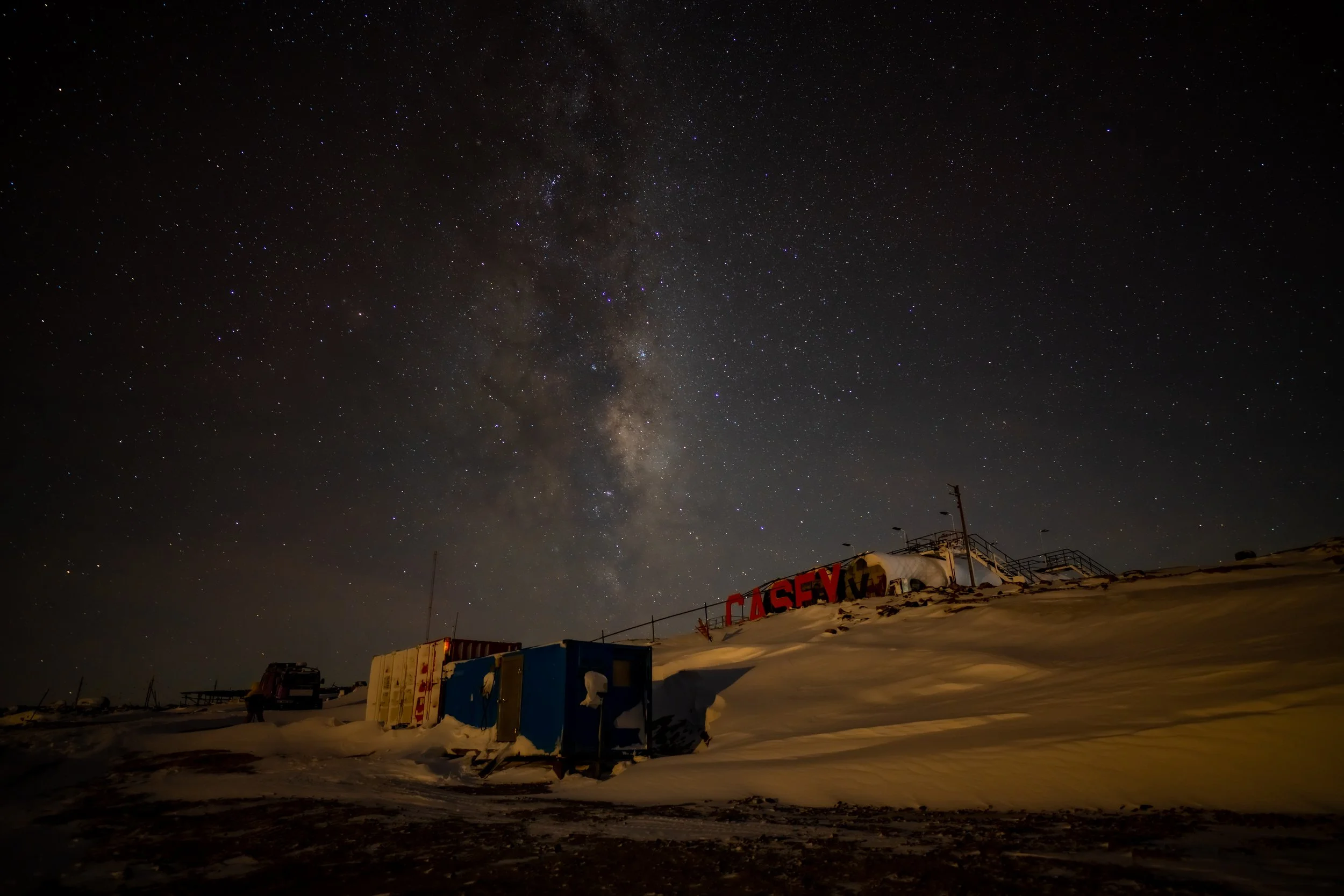 C256 - 9th of May 2022 8:45 pm - Milky Way over the Casey sign next to the fuel farm at Casey wharf