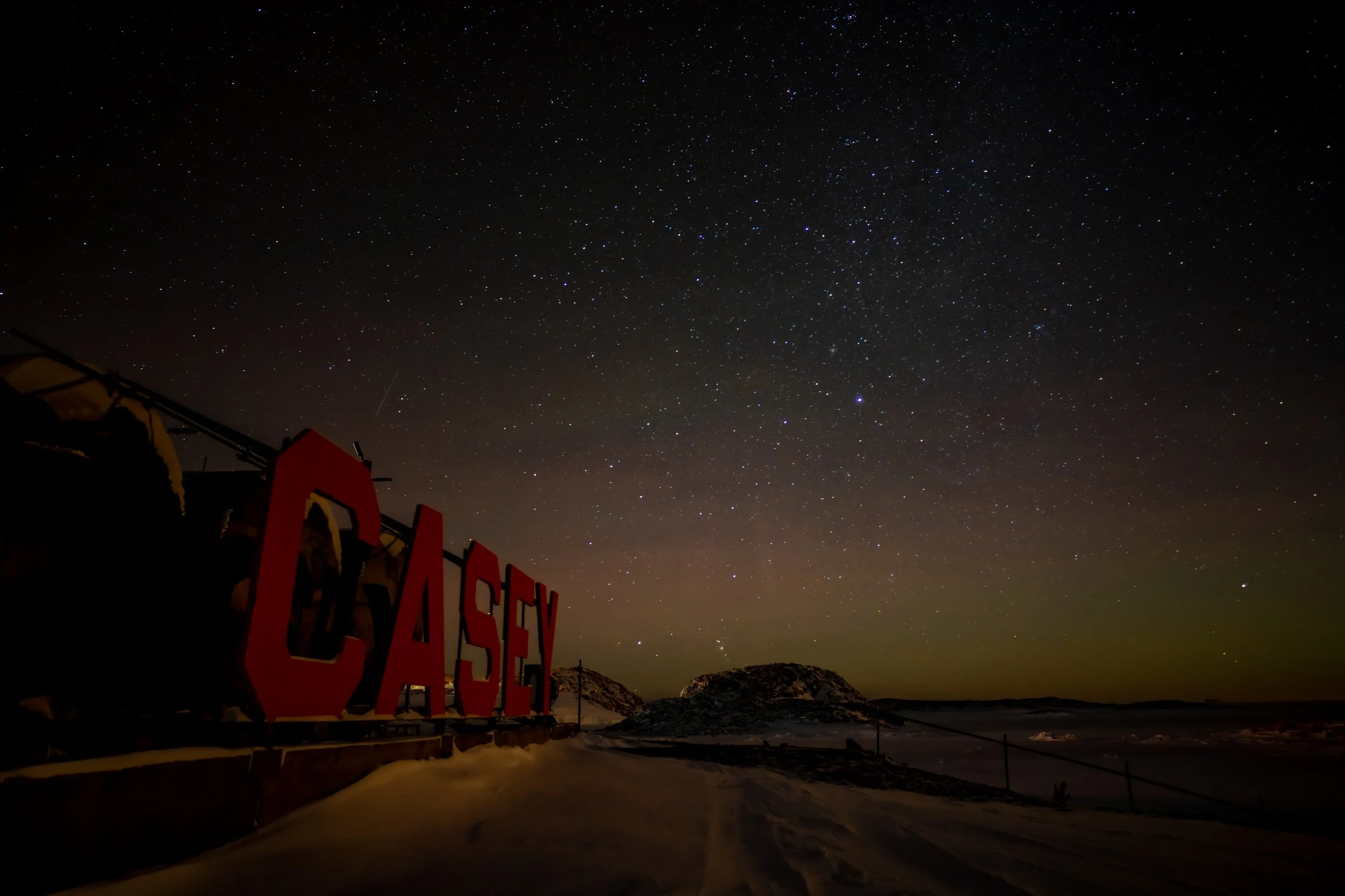 C280 - 9th of May 2022 9:13 pm - Casey sign next to the fuel farm at Casey wharf with Budnick Hill in the background