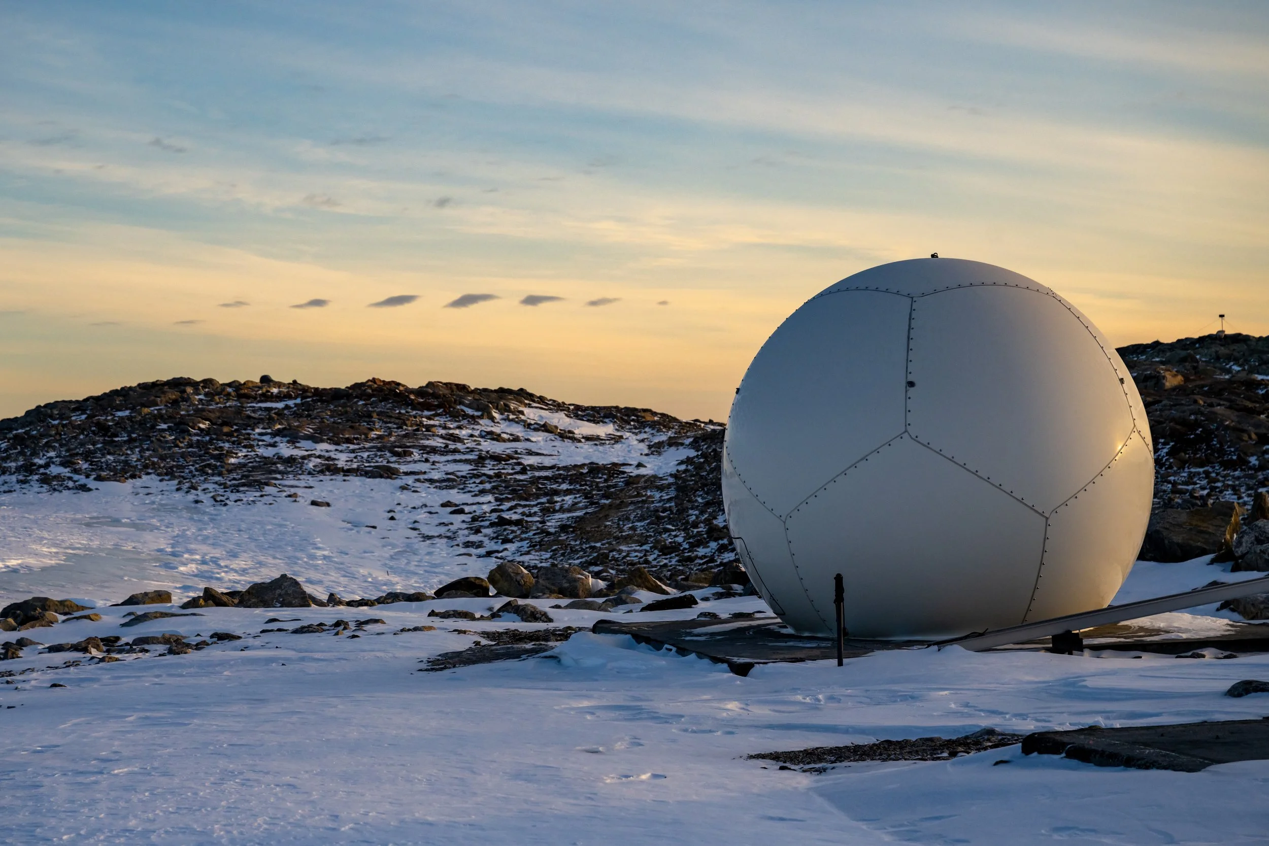 C303 - Unusual row of small cloud elements to the west of Casey