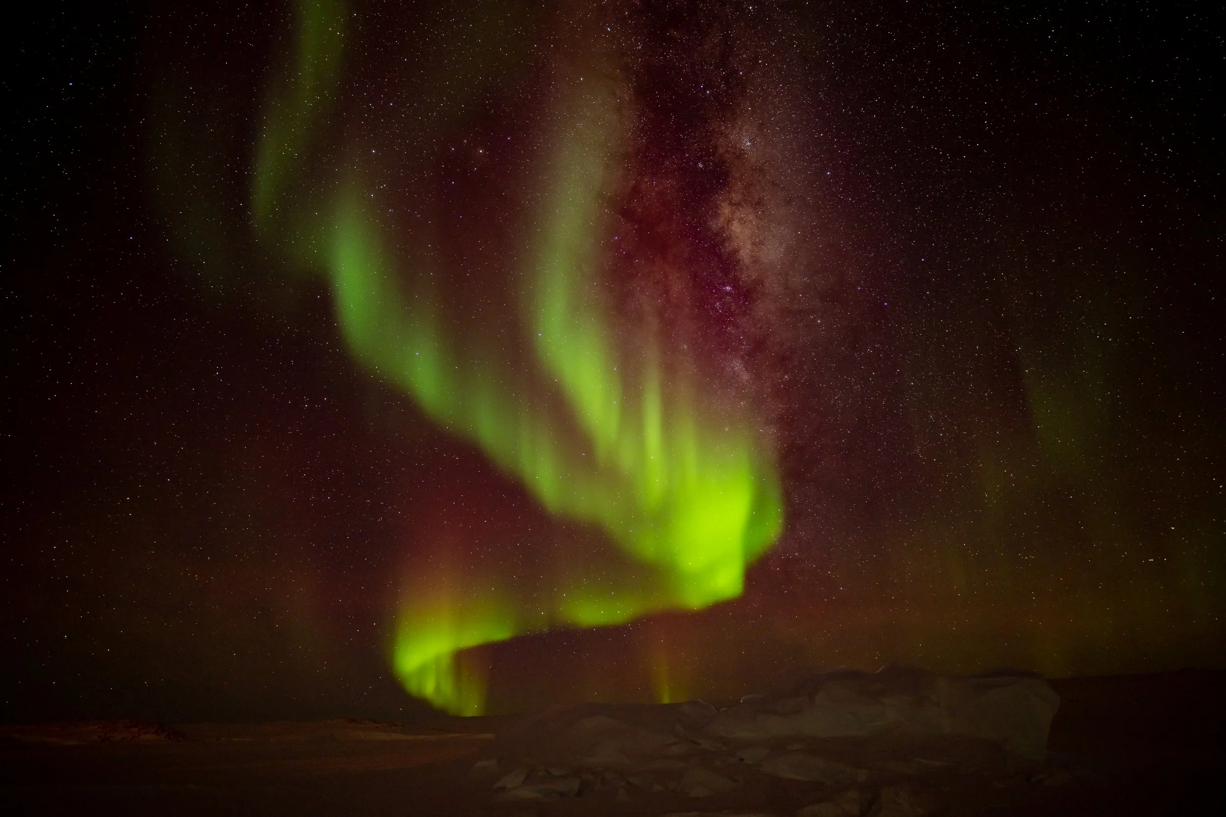 C328 - 25th of June 8:21 pm - this very expansive Aurora and Milky Way was taken whilst walking on the sea ice