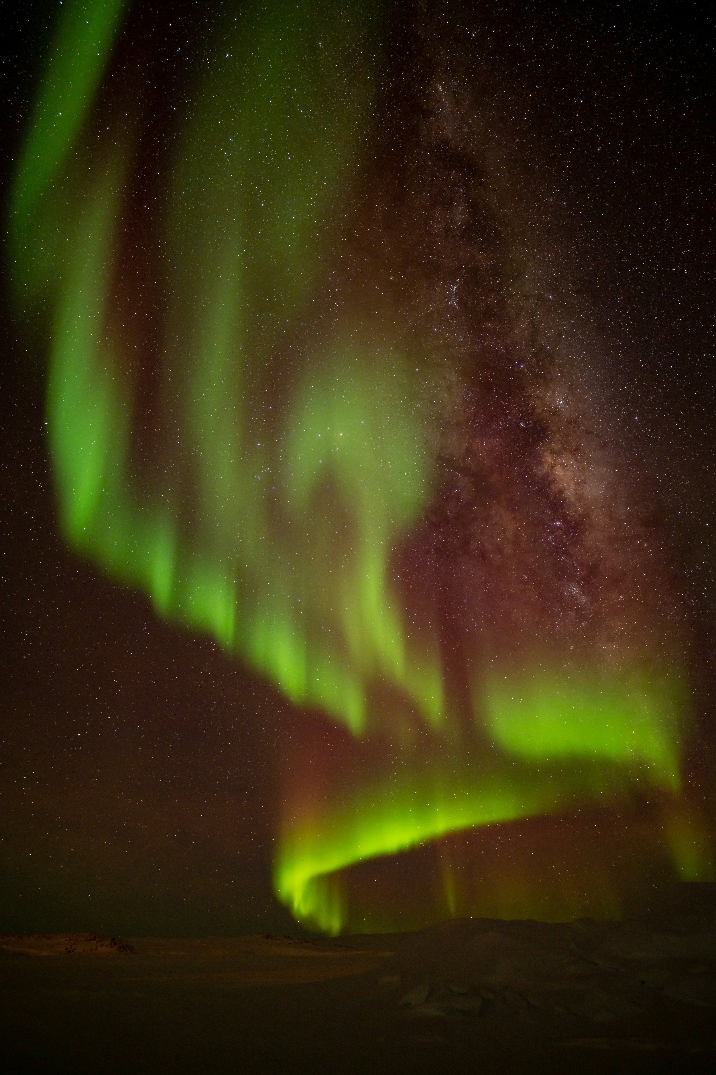 C338 - 25th of June 8:25 pm - this expansive Aurora and Milky Way was taken whilst walking on the sea ice