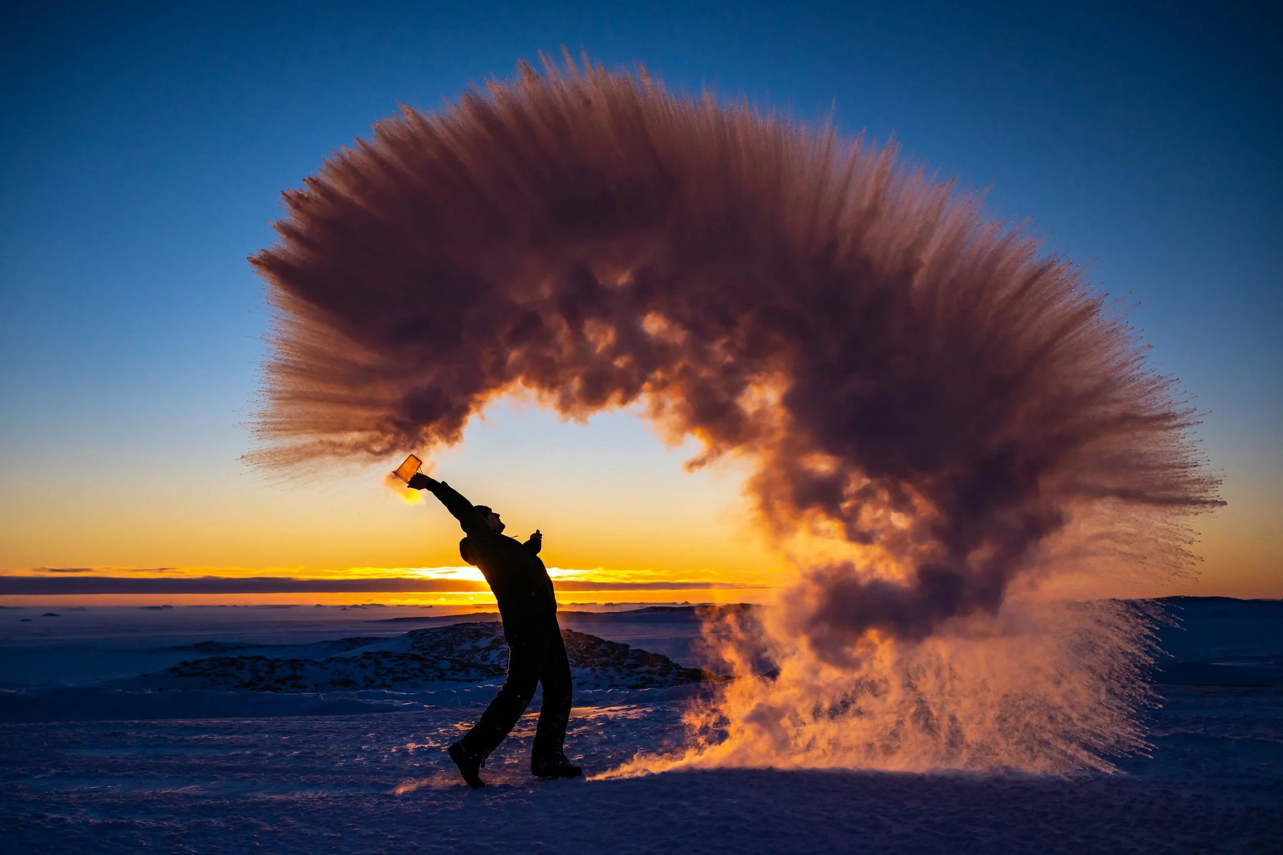 C352 - 29th June 12:56:56 pm - Sequence #3 Justin making a cloud by throwing a jug of hot water into the very cold air