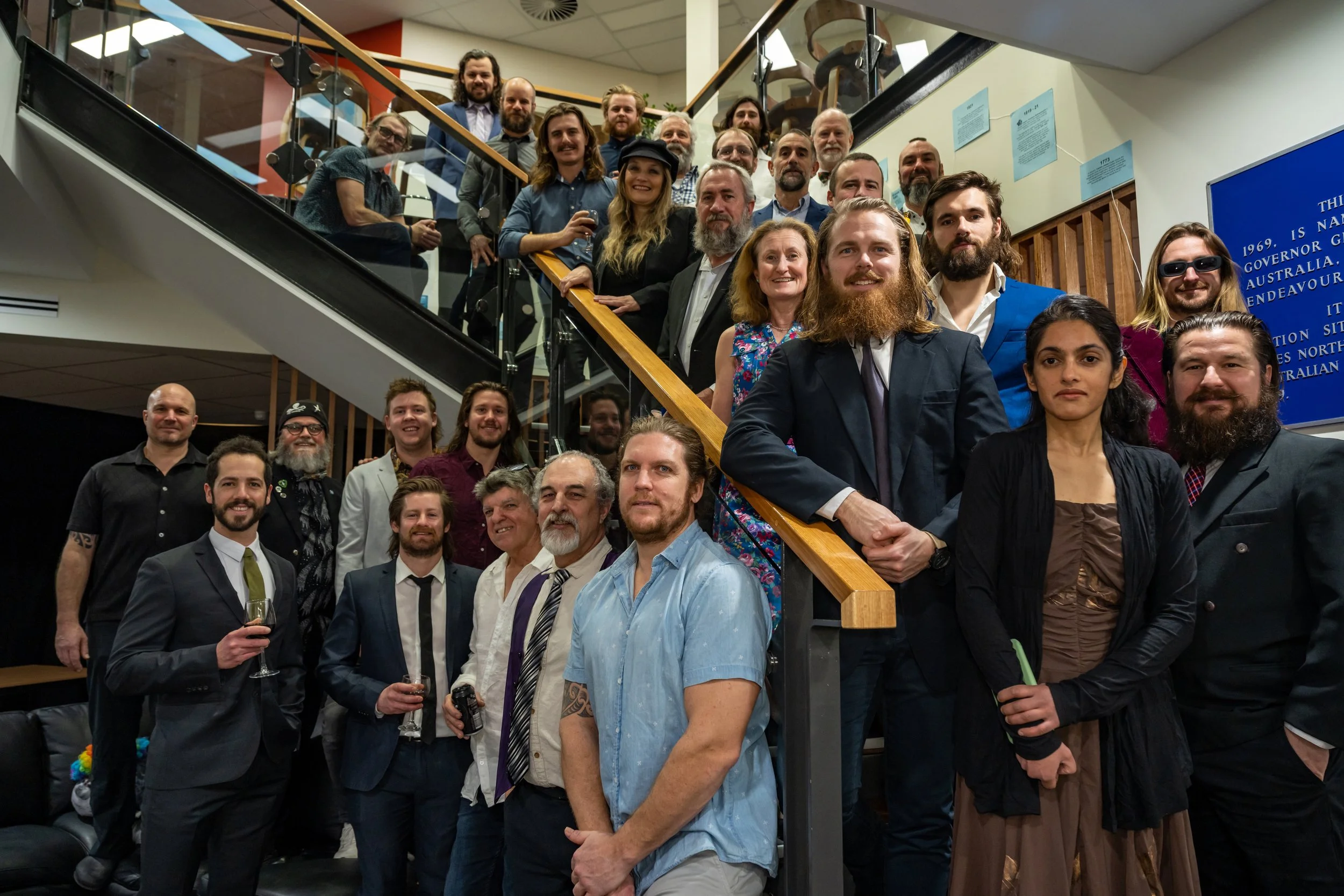 C359 - 21st of June - Group photo of Casey ANARE 75 Winter expeditioners celebrating Mid Winters (Solstice) Day