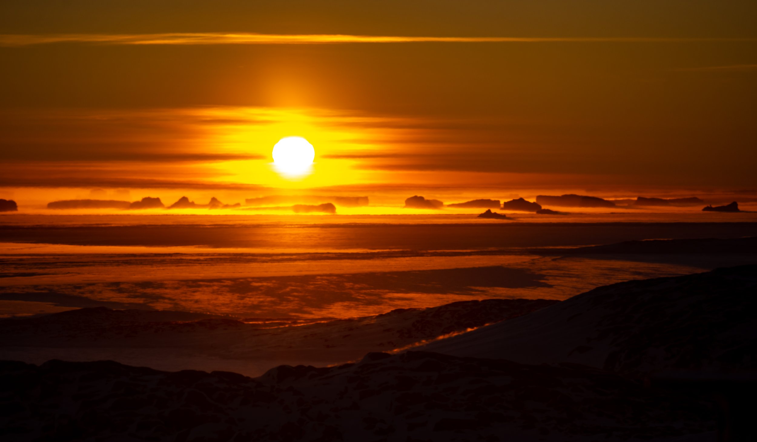 C365 - 13th of June 1:29 pm - awesome sunset over the icebergs in Newcomb Bay