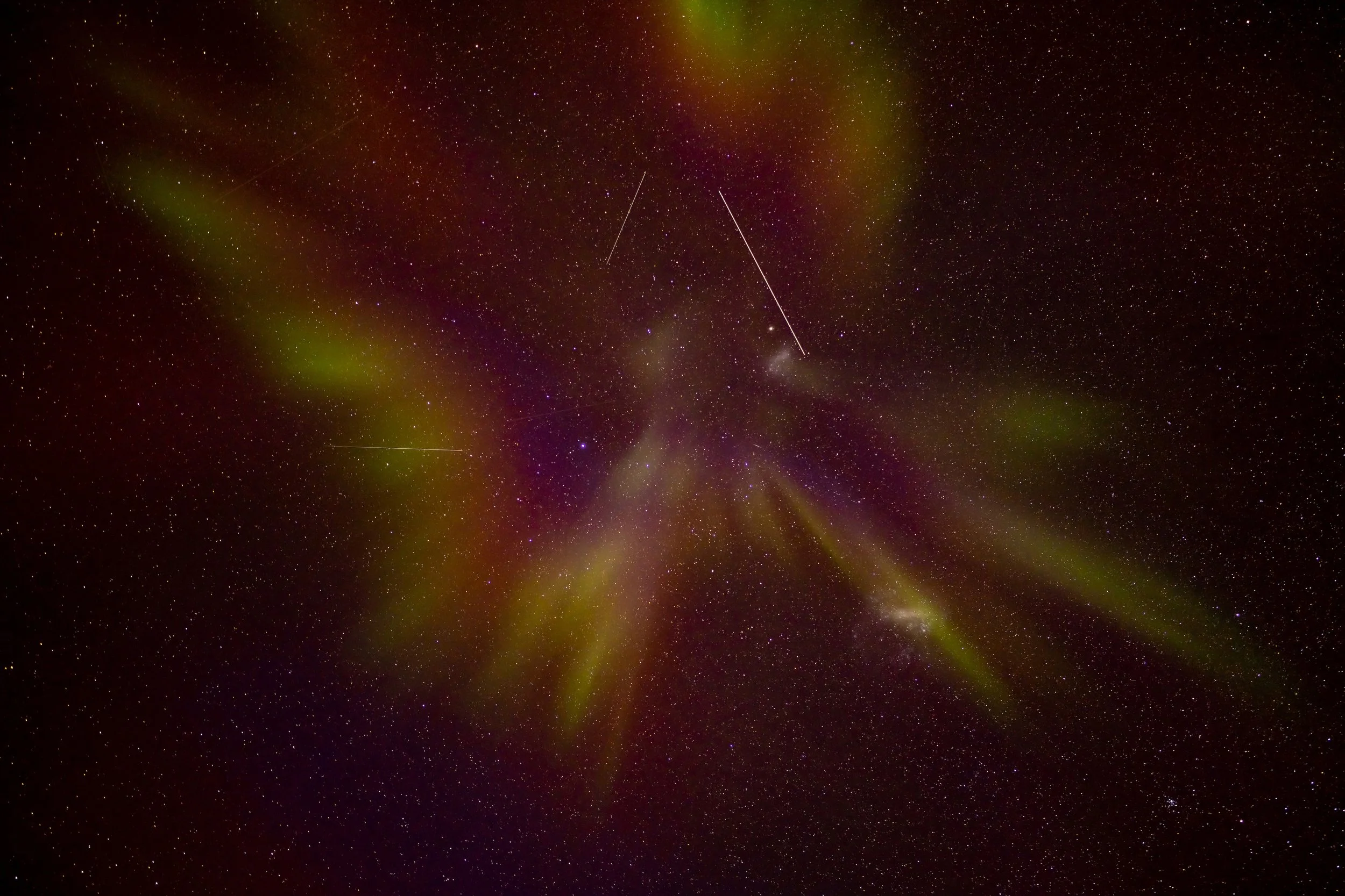 C388 - 10th of July 7:36 am - Early morning Aurora overhead of Casey, with numerous satellite and star trails