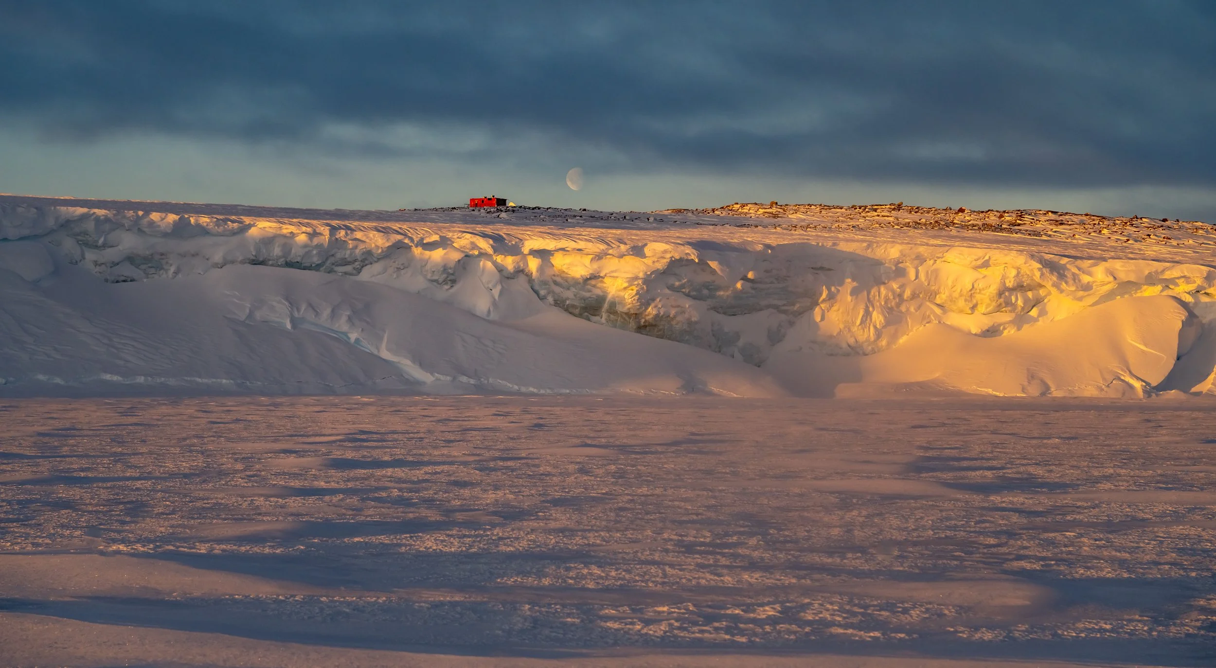 C390 - 10th of July 12:44 pm - View of Robbo's Hut whilst walking on the sea ice in the channel between Sparkes Bay and Penney Bay 
