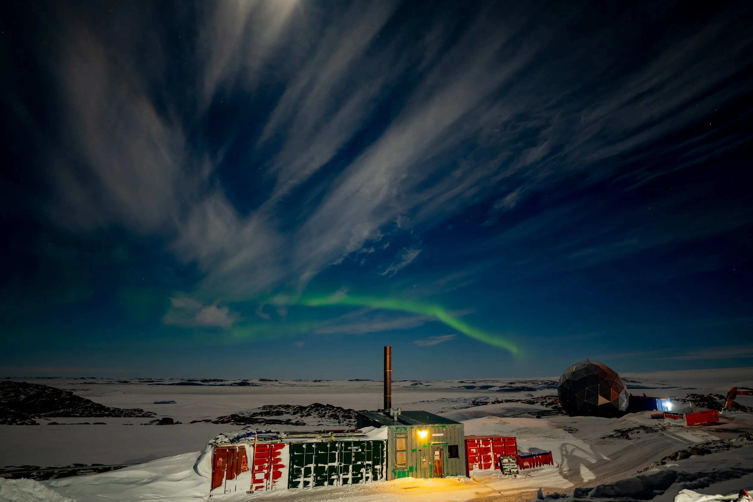 C418 - 12th of July 11:12 pm - Moonlight illuminates the high cloud and landscape whilst a weak Aurora happens to the north