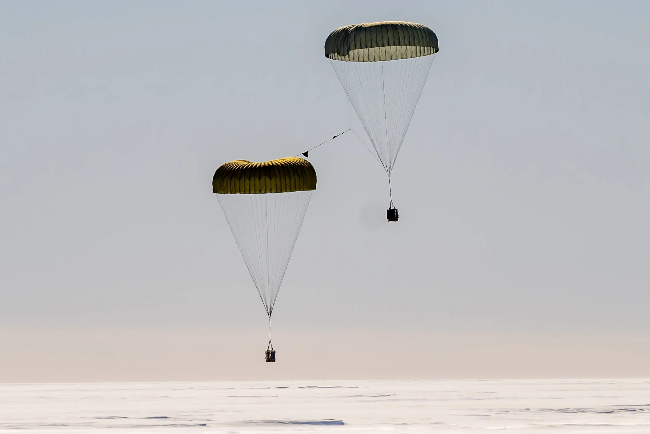 C547 - 14th of October 11:45 am - RAAF C17 A Globemaster III dropped 2 packages - the parachutes just before touchdown