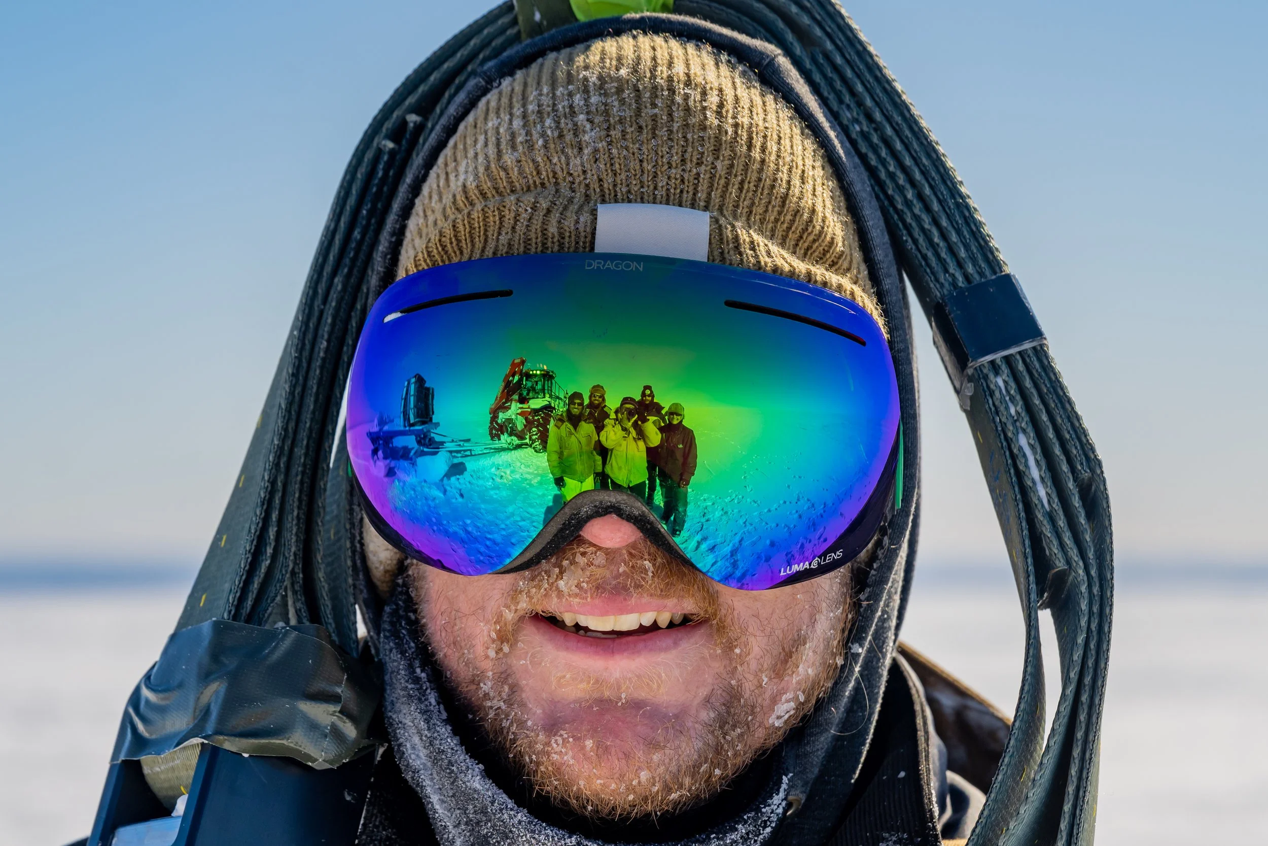 C548 - 4th of October 1:12 pm - Packages being retrieved after the RAAF C17 A Globemaster III airdrop - the drop zone crew reflection in Perry's goggles