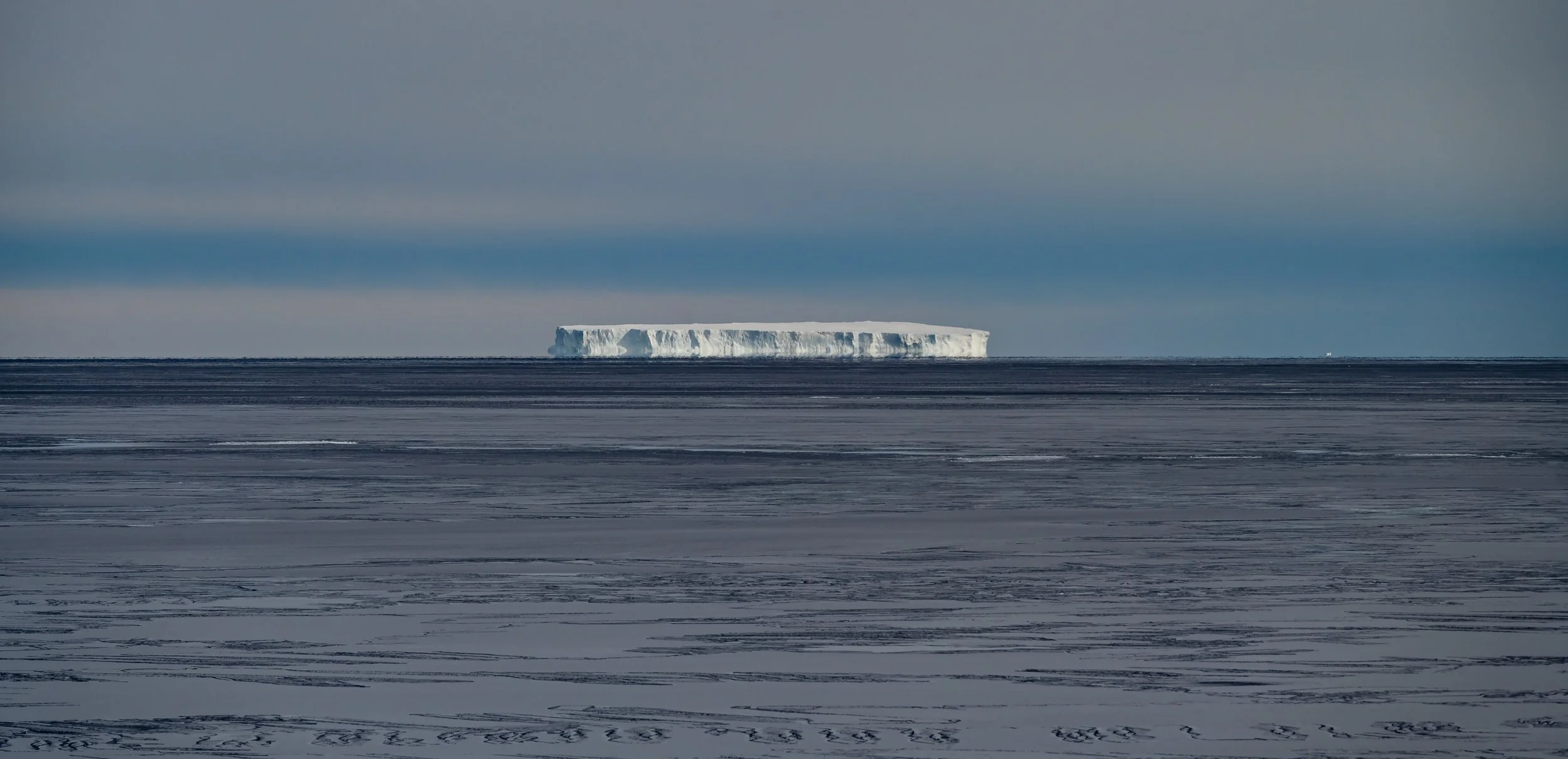 C580 - 9th of October 12:32 pm - Distant iceberg in Newcomb Bay - taken from Shirley Island
