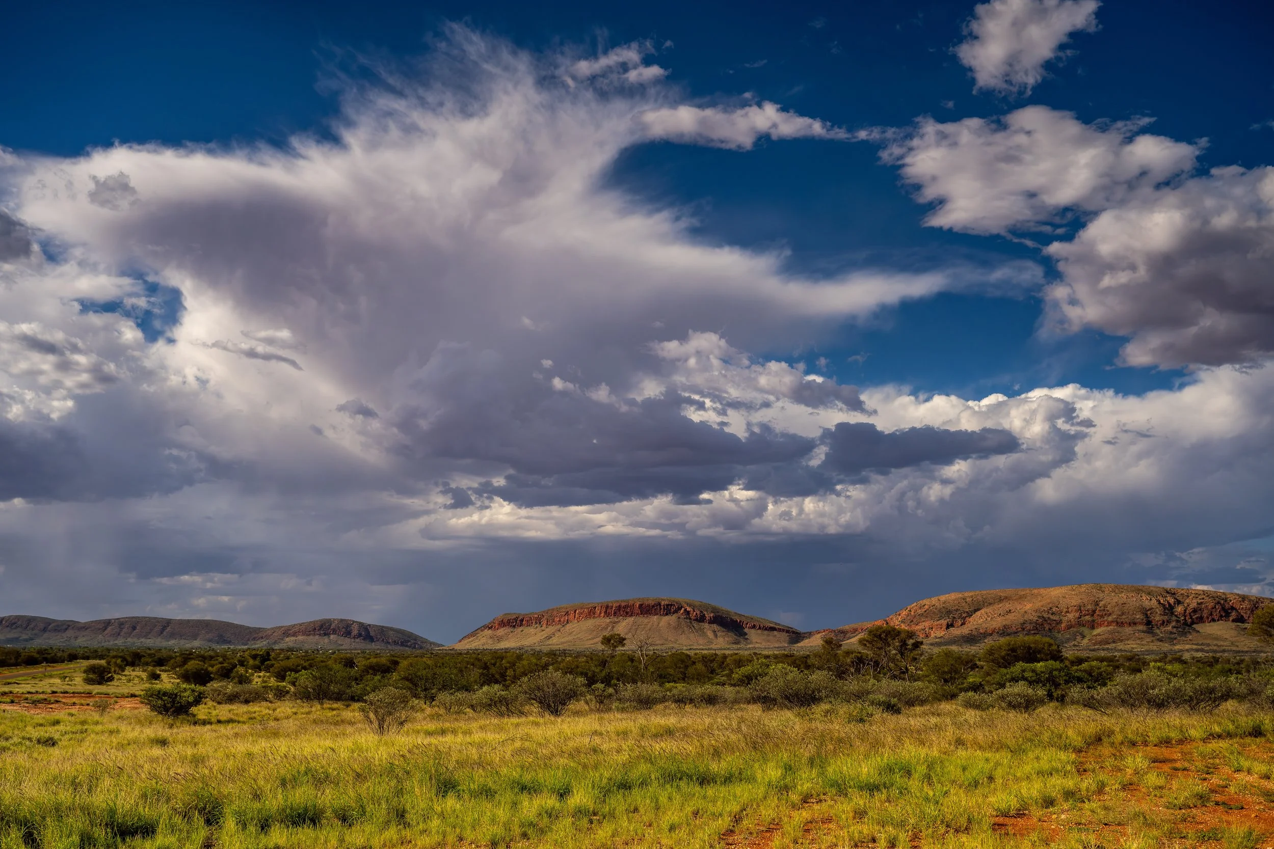 G046 - 4th of December 2024 16:44 - storm clouds building to the north of Purli Yurliya (Rawlinson Ranges).