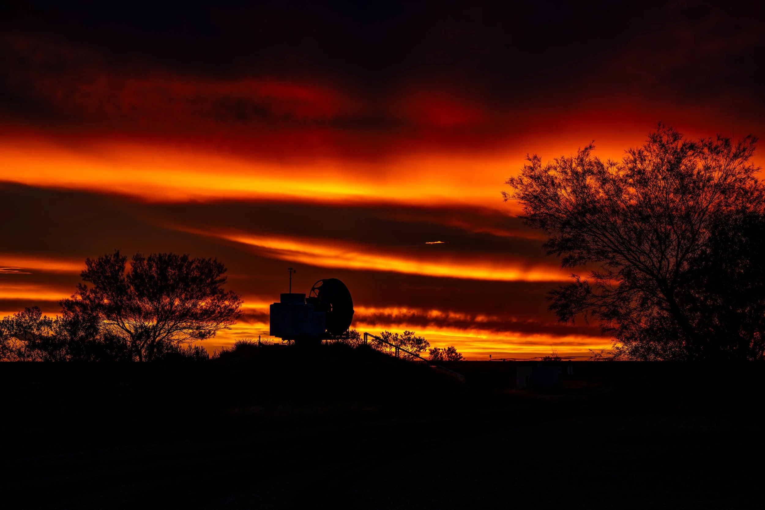 G055- 16th of December 2024 18:21 - Fiery sunset over the old WF2 radar at Giles Weather Station
