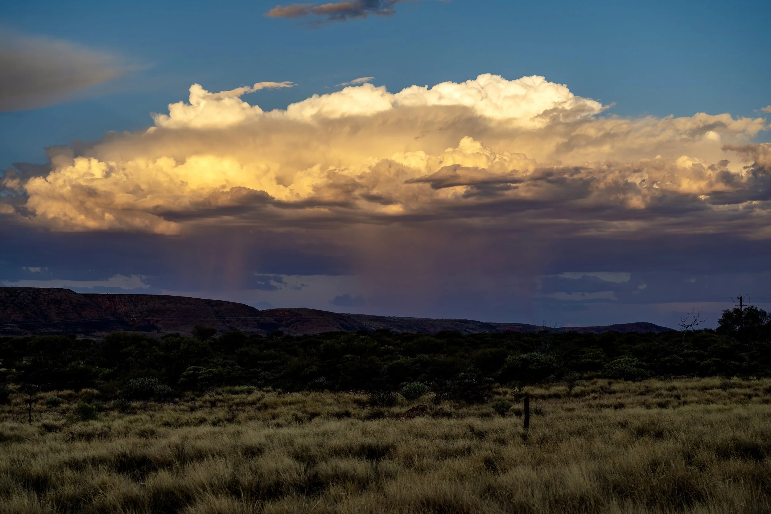 G113 - 27th of January  2025 18:08 - Developing storm at sunset over Purli Yurliya (Rawlinson Ranges).