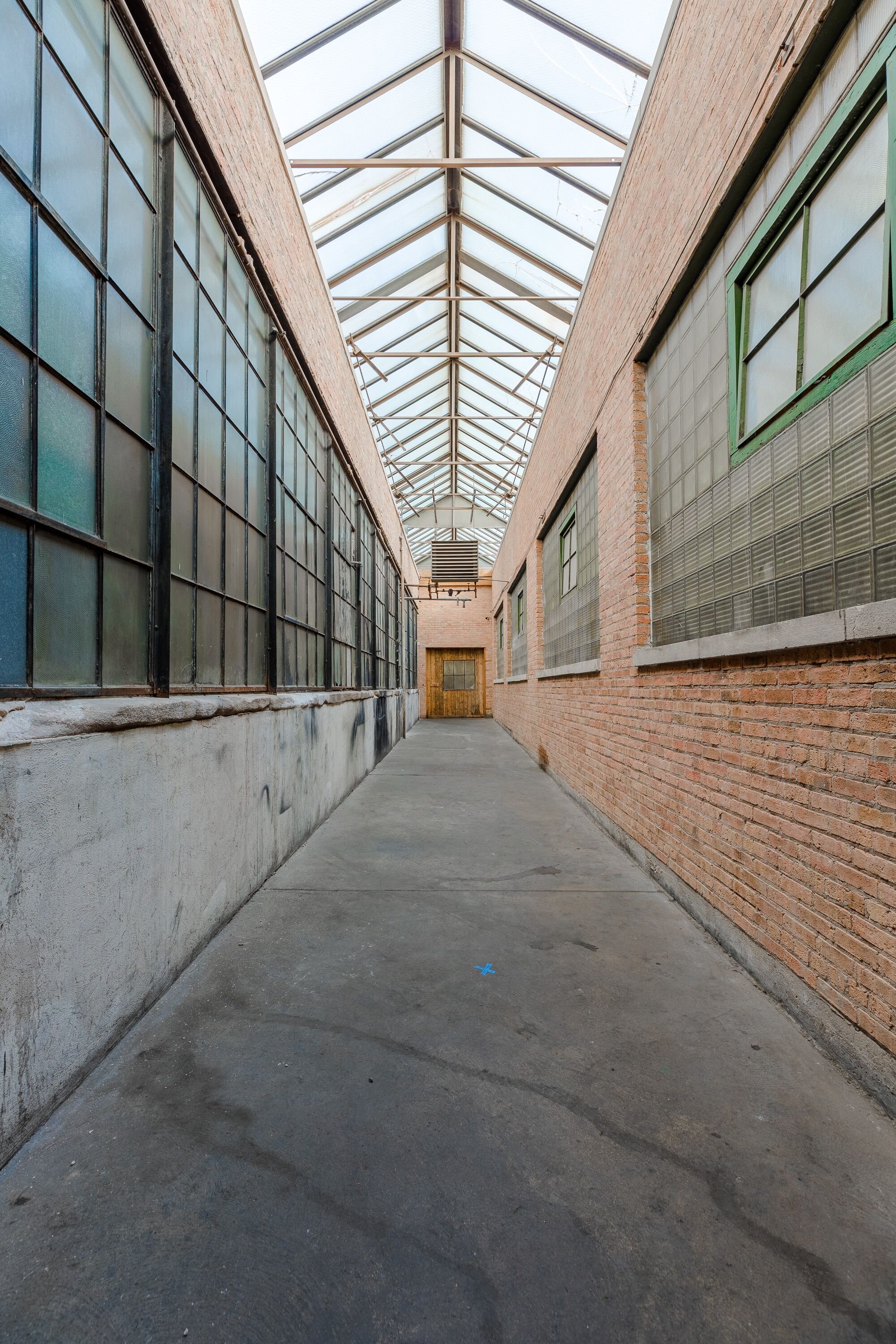 CHP - Atrium Vertical Looking To Wood Door.jpeg