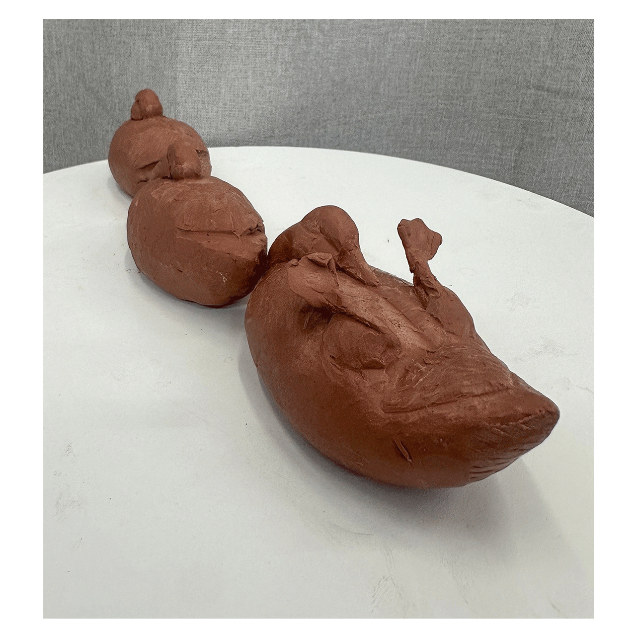 joshua-tobey-bronze-sculpture-duck-odd-duck-rear-view.png