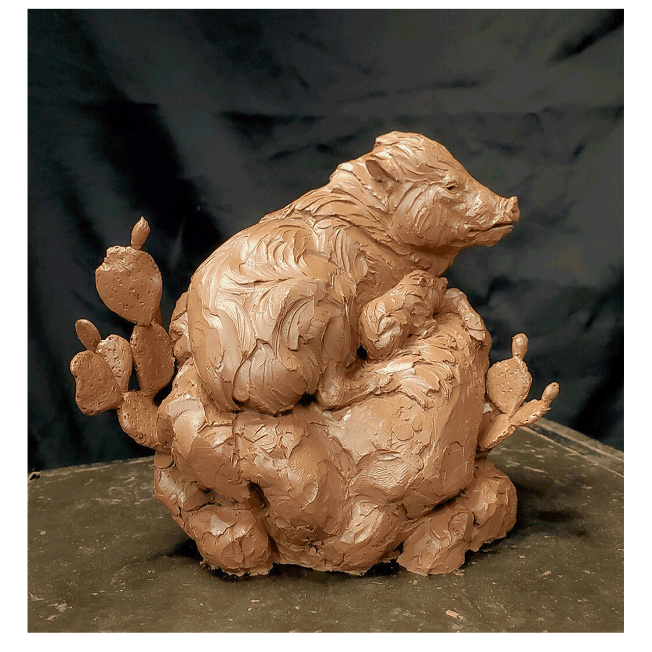 ken-rowe-sculpture-javelina-a-new-day-is-born-precast.png