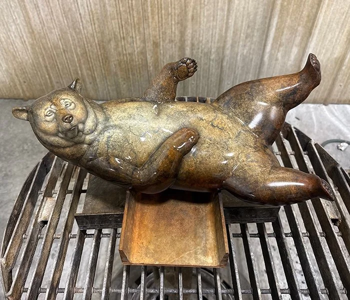 Joshua-Tobey-Bronze-Sculpture-Bears-Lounging Bear.jpg