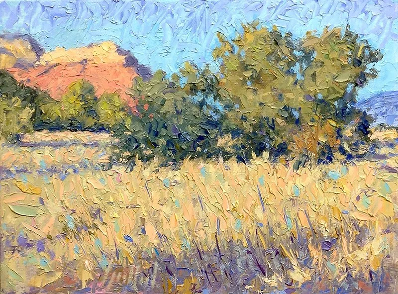 Grassland and Red Rocks
