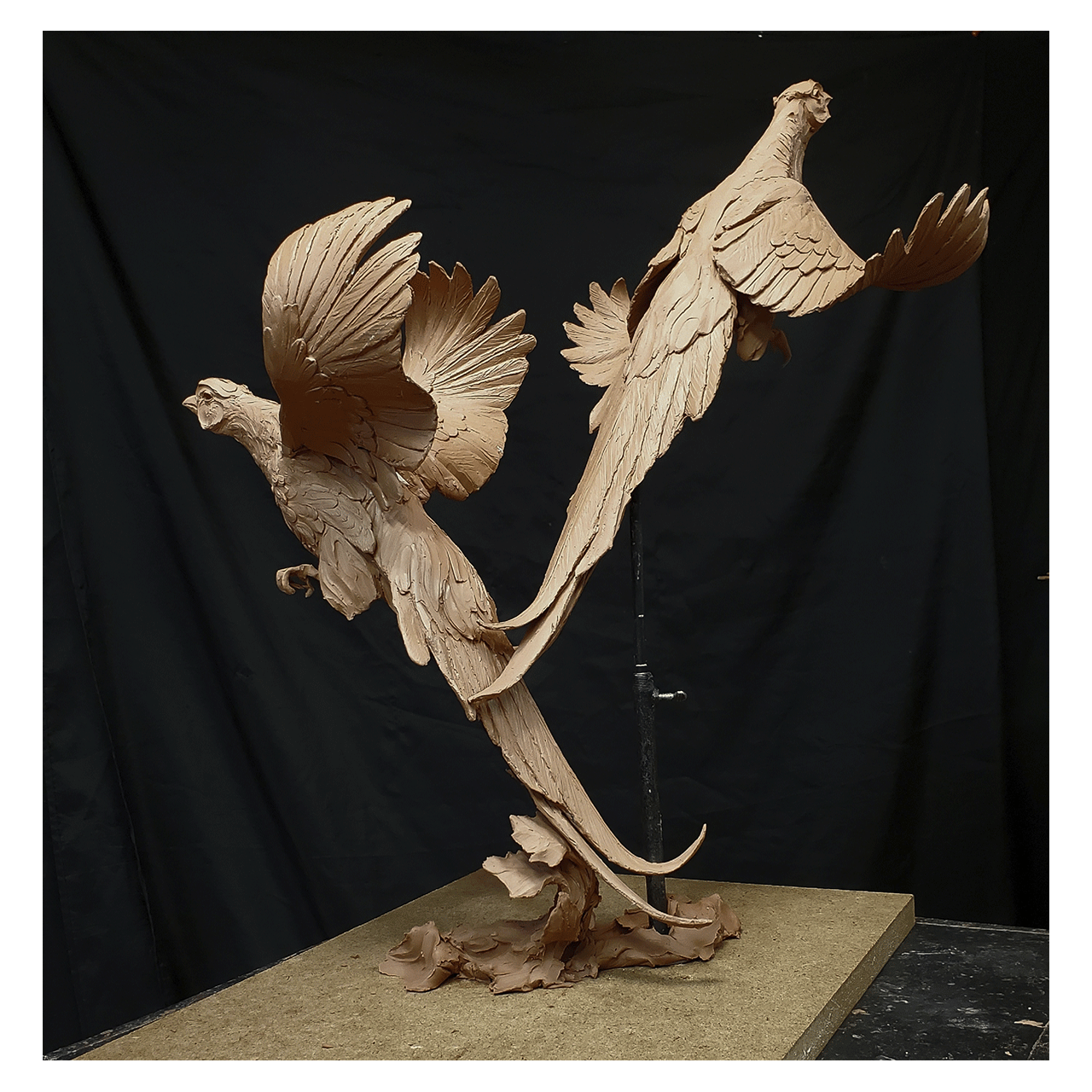 ken-rowe-sculpture-pheasant-lift-off-precast--back-viewt.png