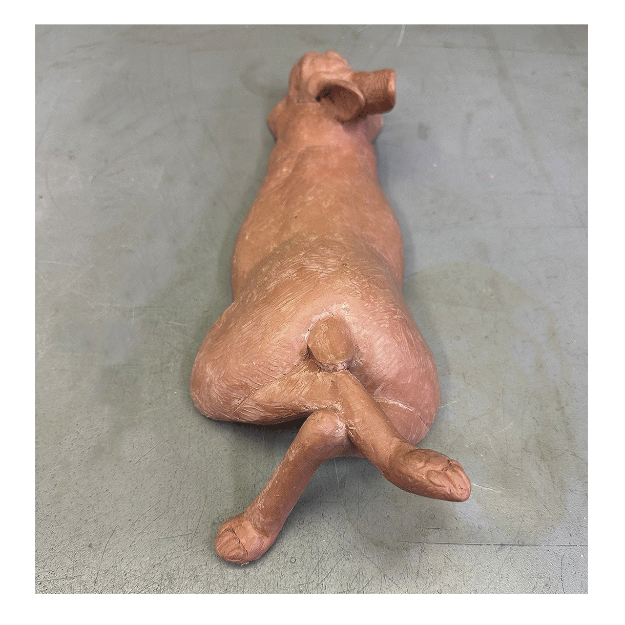 joshua-tobey-bronze-sculpture-rabbit-bunny-laying-on-belly-back-view.png